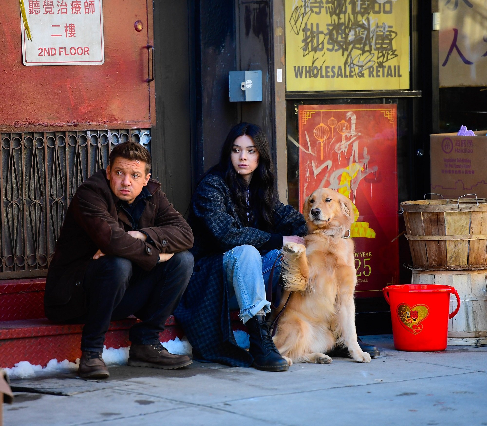 Jeremy Renner and Hailee Steinfeld are seen on the set of 'Hawkeye' in Chinatown on December 3, 2020 in New York City.