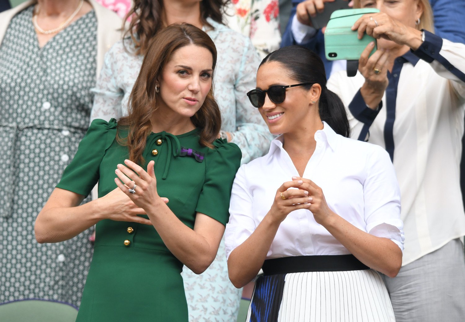 Kate Middleton and Meghan Markle in the Royal Box on Centre Court during day twelve of the Wimbledon Tennis Championships 2019