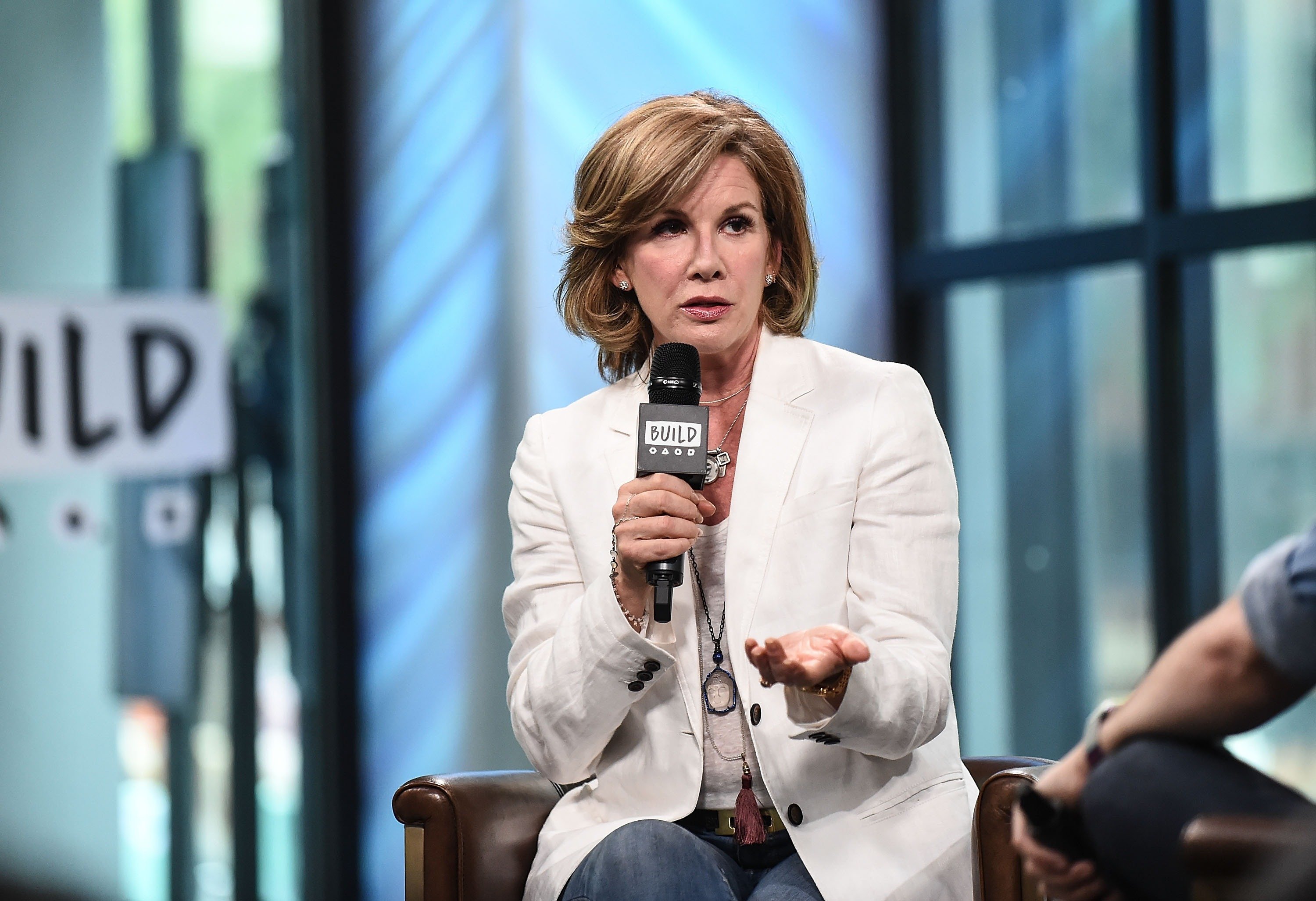 Melissa Gilbert with a microphone