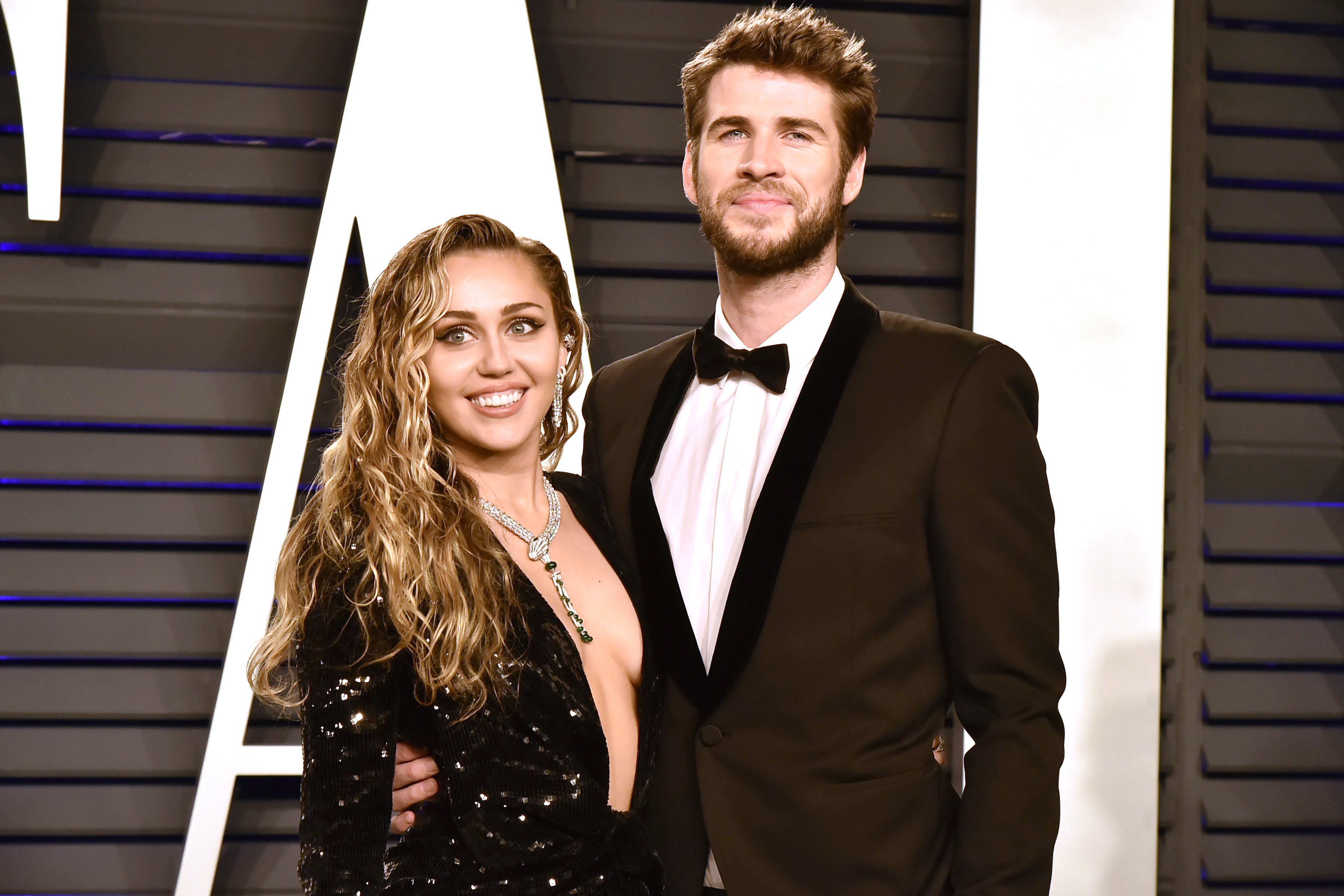 Liam Hemsworth and Miley Cyrus attend the 2019 Vanity Fair Oscar Party on February 24, 2019 in Beverly Hills, California.
