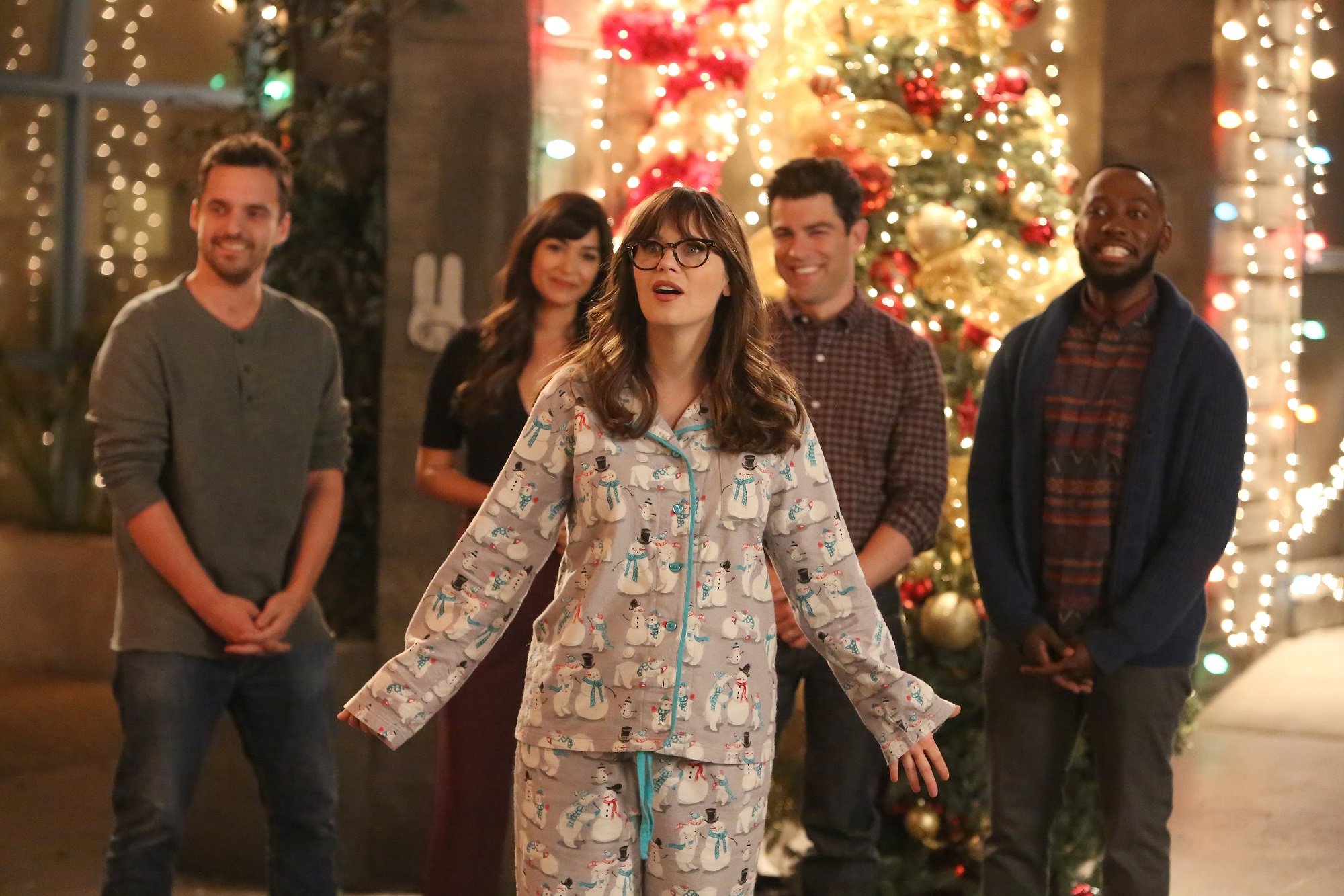 L-R: Jake Johnson, Hannah Simone, Zooey Deschanel, Max Greenfield and Lamorne Morris in one of the 'New Girl' Christmas episodes.