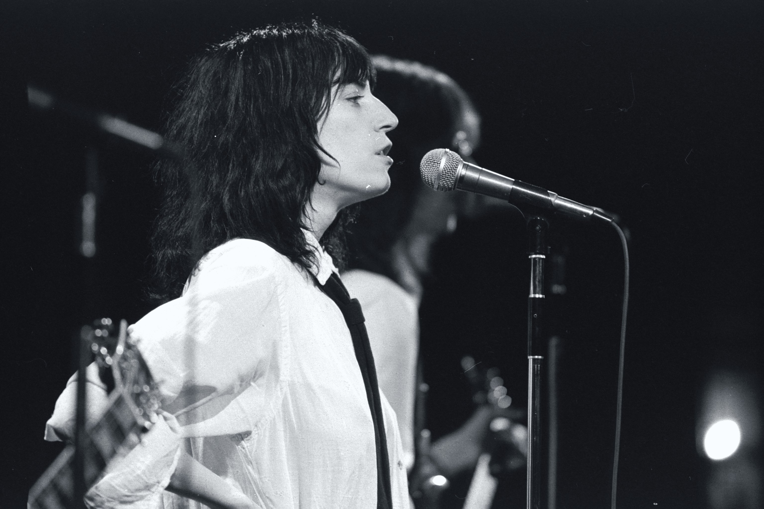 Patti Smith with a microphone