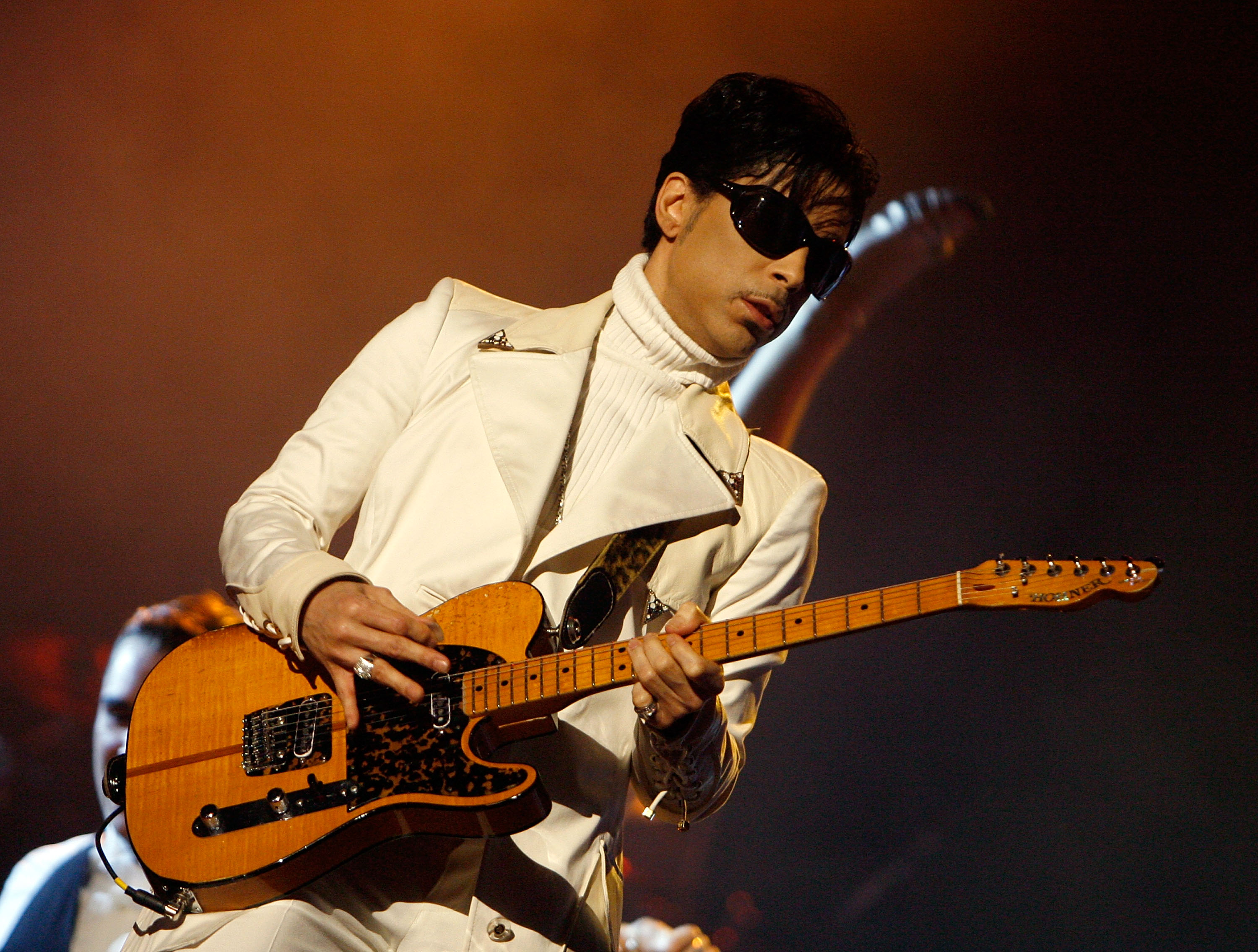 Prince wearing white