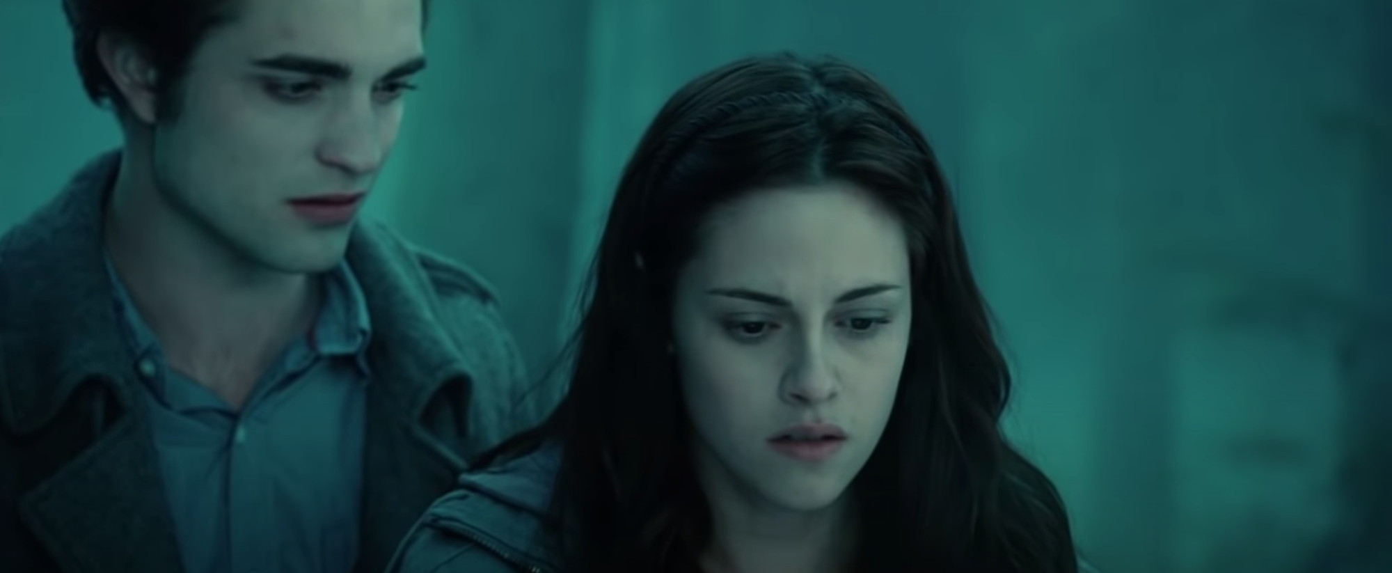 Edward Cullen (Robert Pattinson) and Bella Swan (Kristen Stewart) in the woods in 'Twilight'