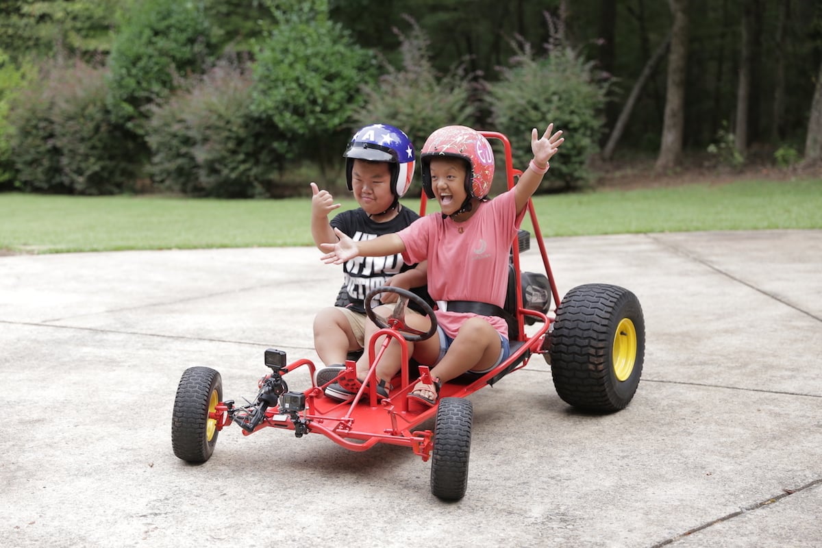 Alex and Emma from '7 Little Johnstons' in a go kart 