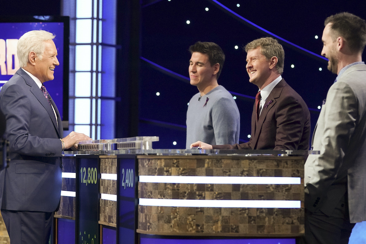 Alex Trebek converses with James Holzhauer, Ken Jennings, and Brad Rutter during the Tournament of Champions