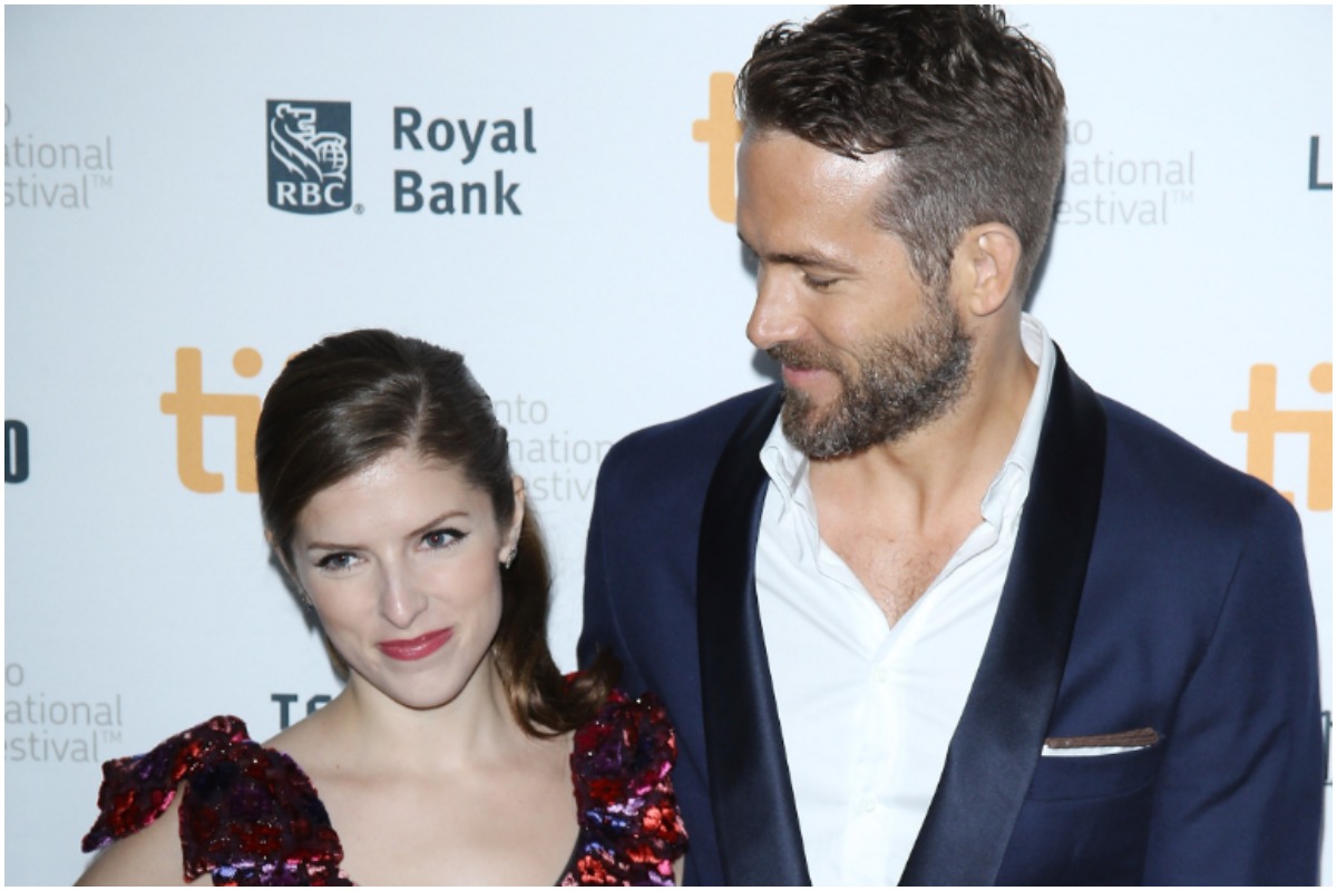 TORONTO, ON - SEPTEMBER 11: Anna Kendrick (L) and Ryan Reynolds arrive at the premiere of The Voices held during the 2014 Toronto International Film Festival - Day 8 on September 11, 2014 in Toronto, Canada.