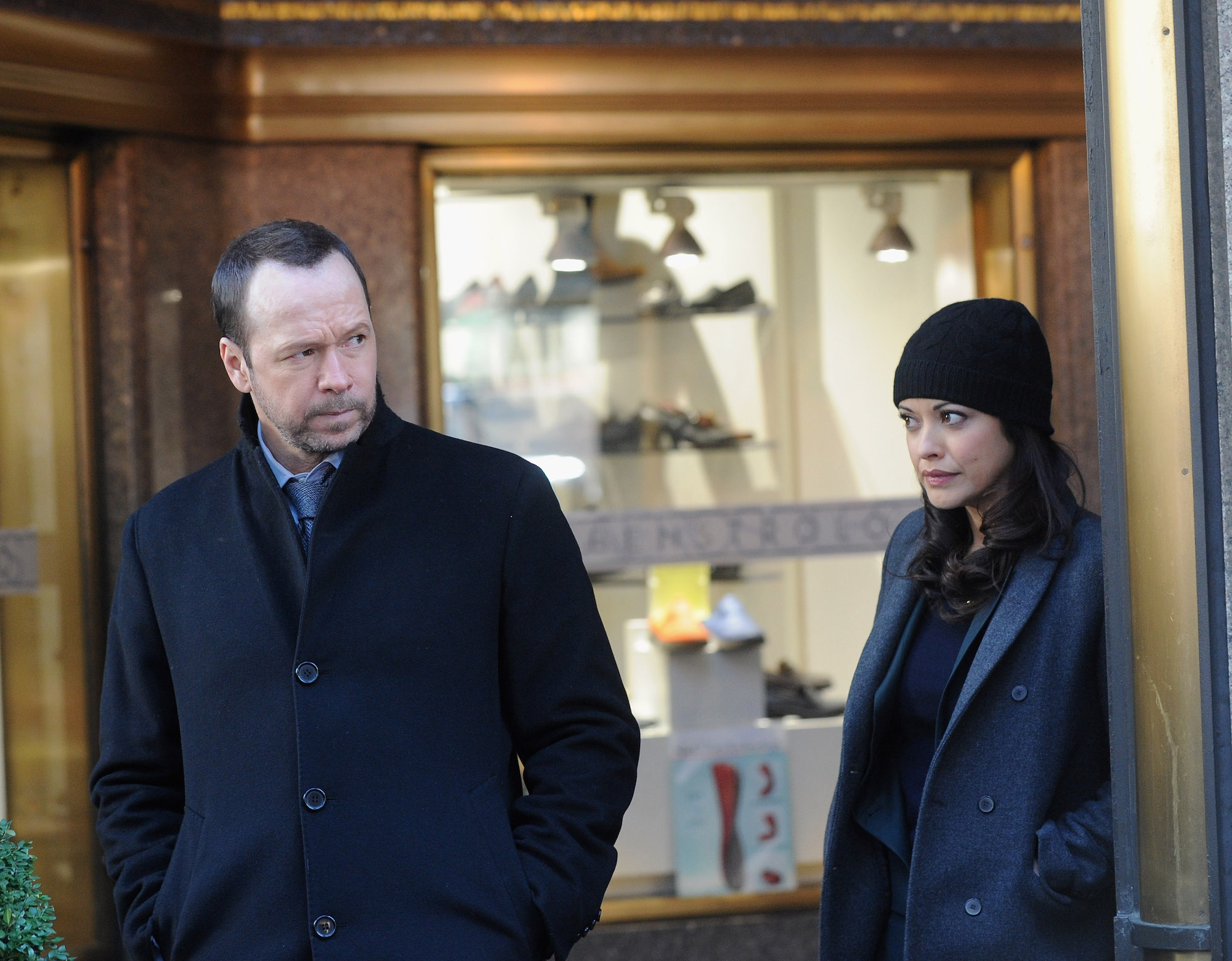 (L-R) Donnie Wahlberg and Marisa Ramirez on set of 'Blue Bloods'
