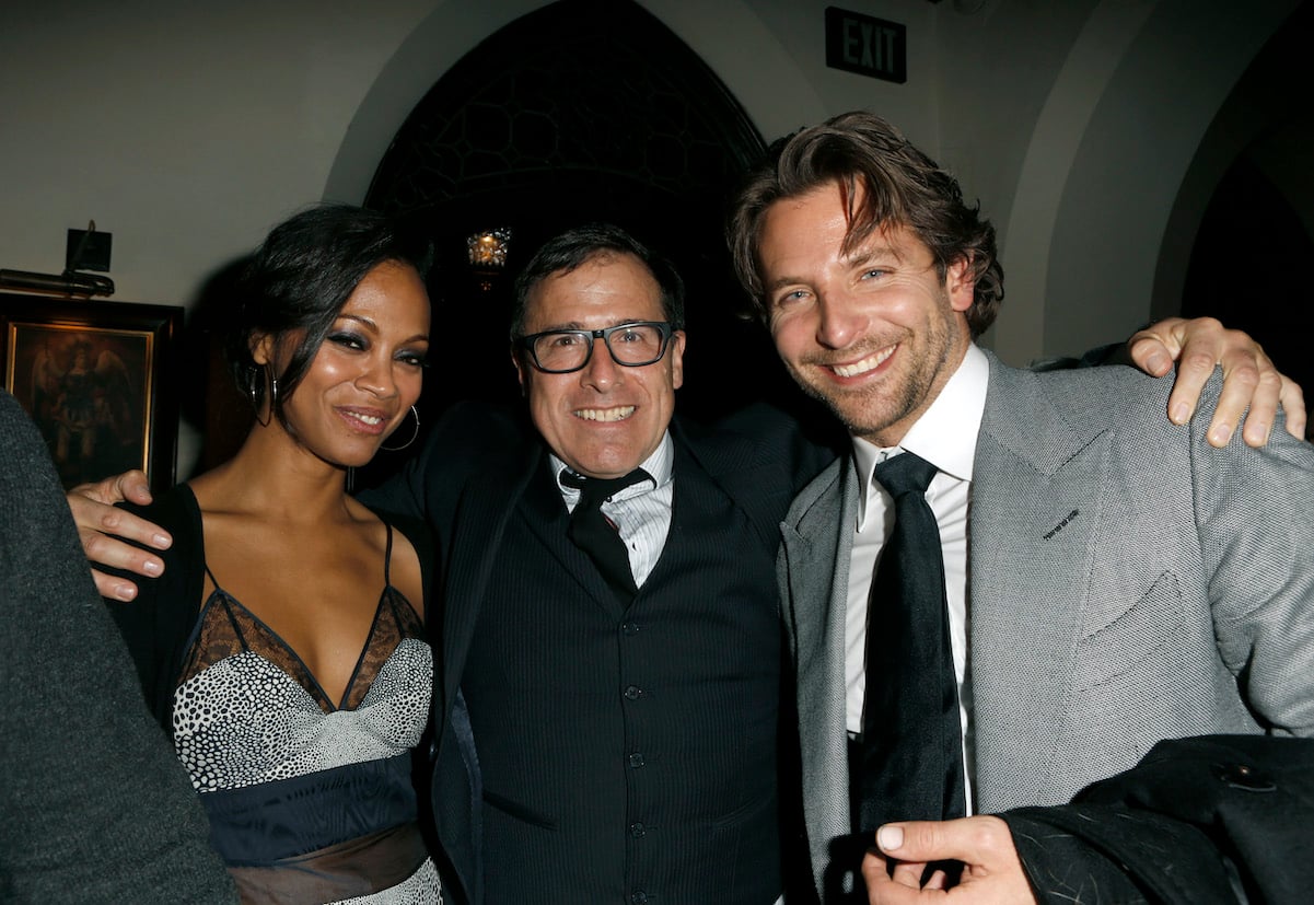 Zoe Saldana with Bradley Cooper (far left) and director David O. Russell (center) 