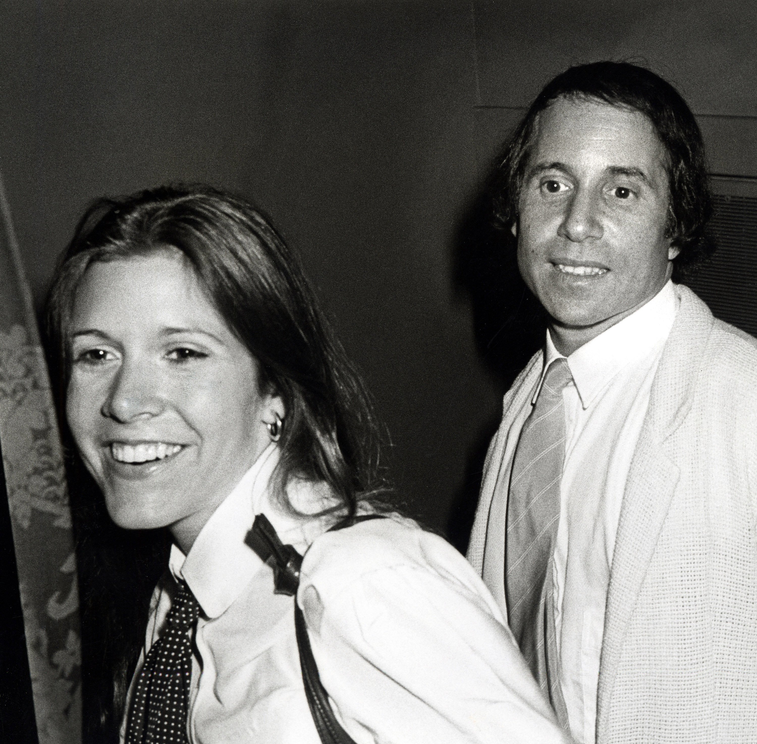 Carrie Fisher and Paul Simon during Opening of "Gilda, Live from New York" - August 2, 1979 at Winter Garden Theatre in New York City, New York, United States.
