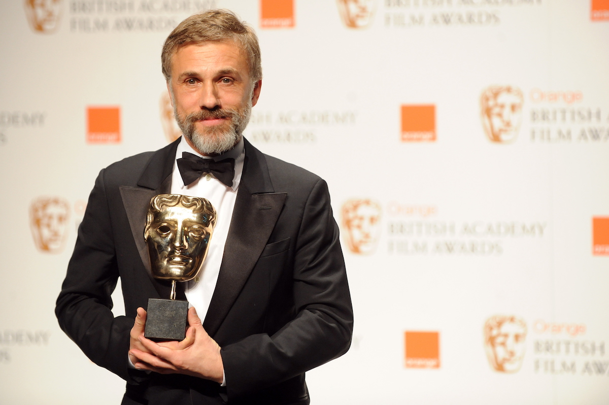Austrian actor Christoph Waltz poses for photographers with his British Academy of Film Award (BAFTA) for 'Best supporting actor' for his role in the film 'Inglourious Basterds' at the Royal Opera House in central London, on February 21, 2010.