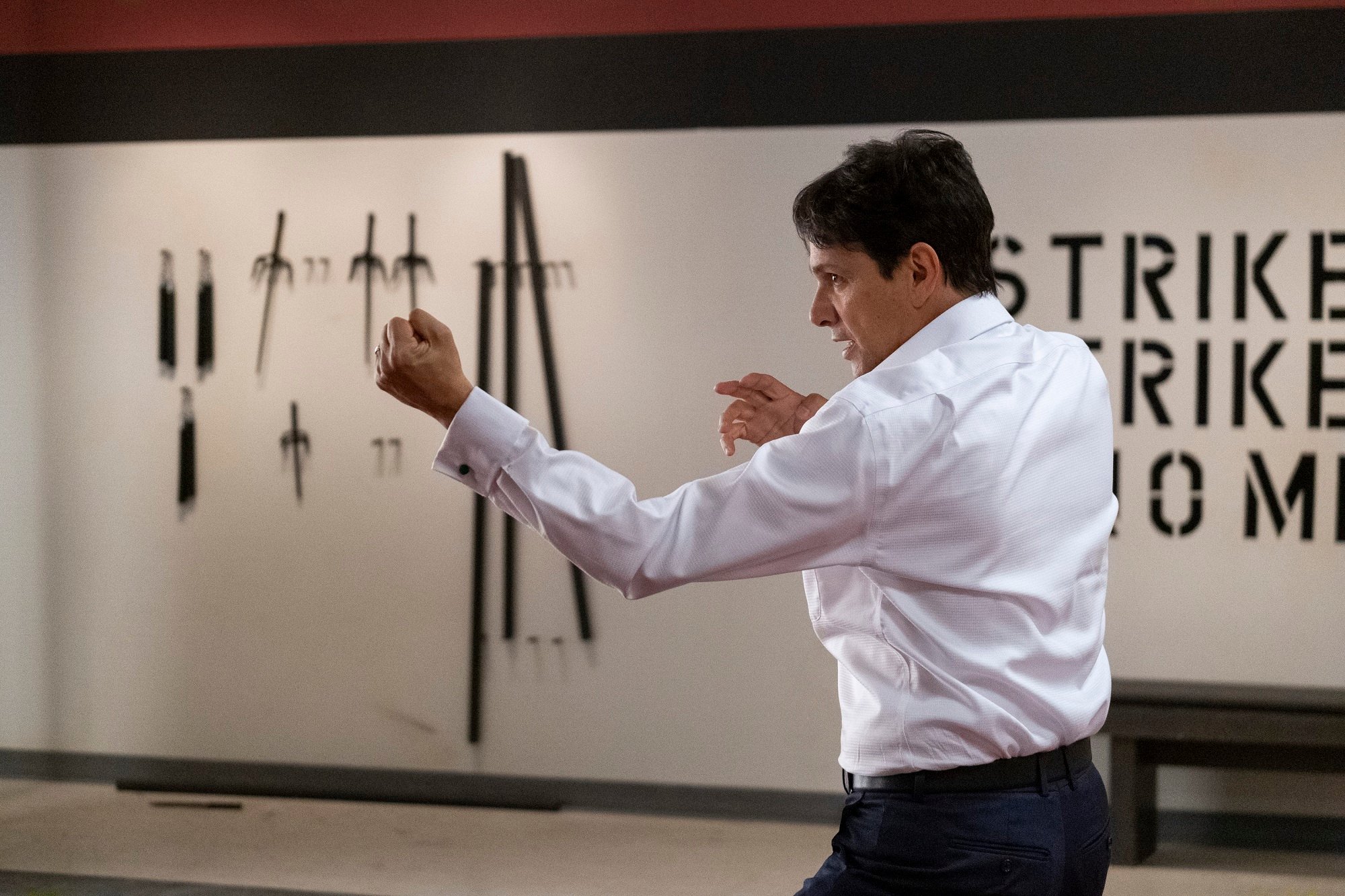 Ralph Macchio takes Karate stance in the Cobra Kai dojjo