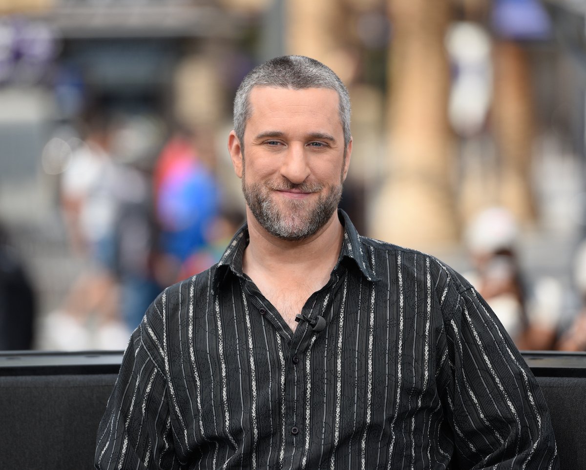 Dustin Diamond visits "Extra" at Universal Studios Hollywood