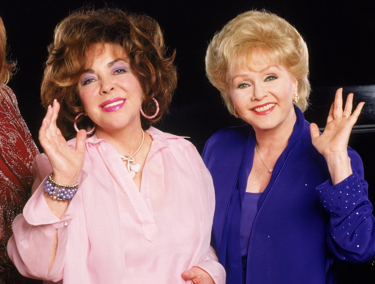 Elizabeth Taylor (L) and Debbie Reynolds (R) in a promotional image for 'These Old Broads' a two-hour comedy written by Carrie Fisher | Timothy White/Walt Disney Television via Getty Images