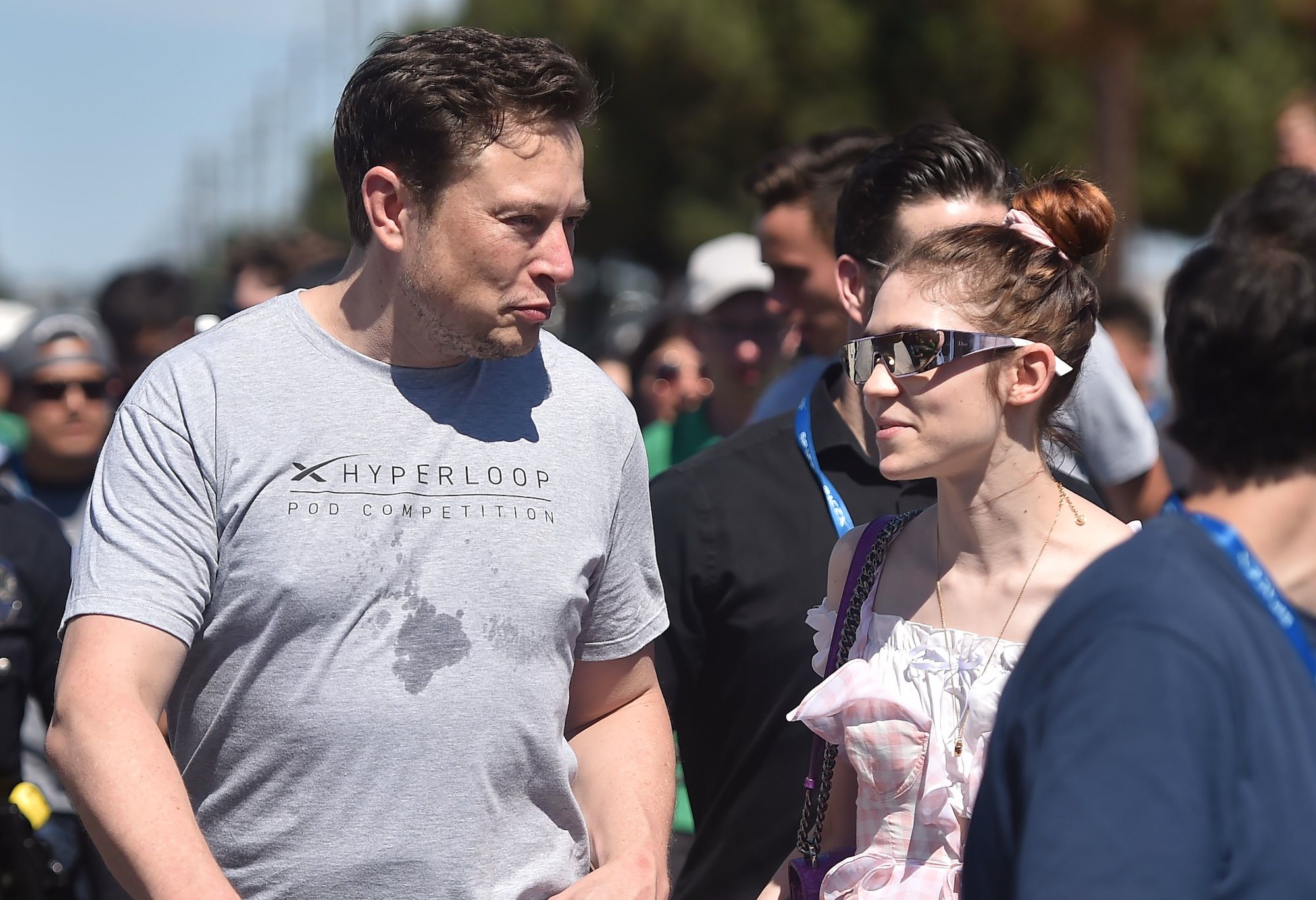 SpaceX founder Elon Musk (L) and Canadian musician Grimes (Claire Boucher) attend the 2018 Space X Hyperloop Pod Competition