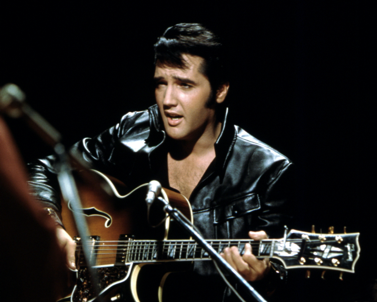 Elvis Presley wearing a leather jacket
