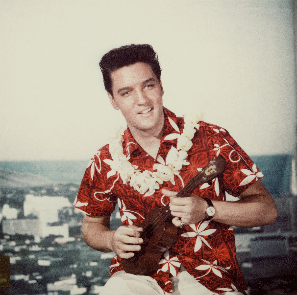 Elvis Presley with a ukelele