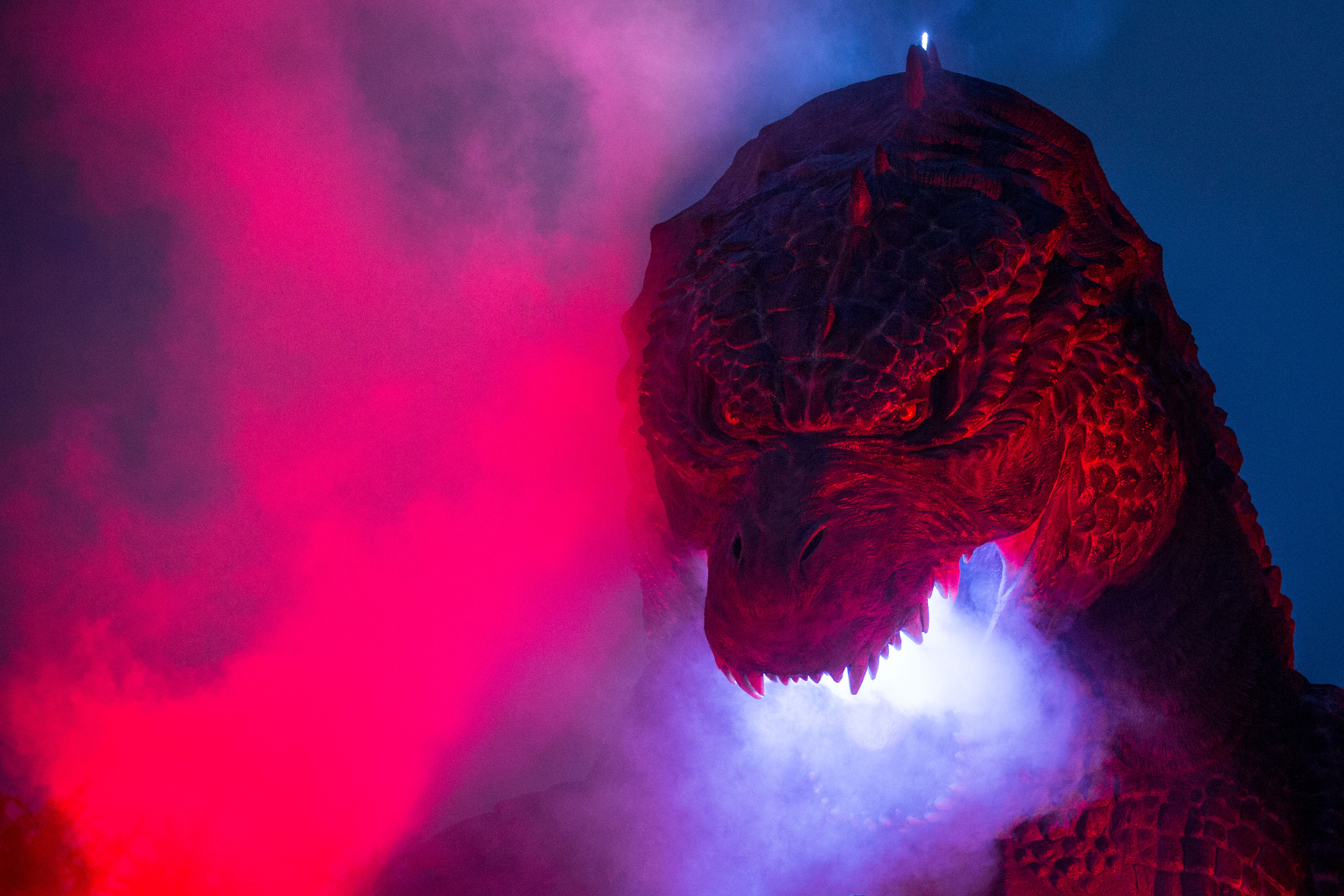 A 6.6 meter replica Godzilla is lit up during a press preview at Tokyo Midtown on July 17, 2014 in Tokyo, Japan