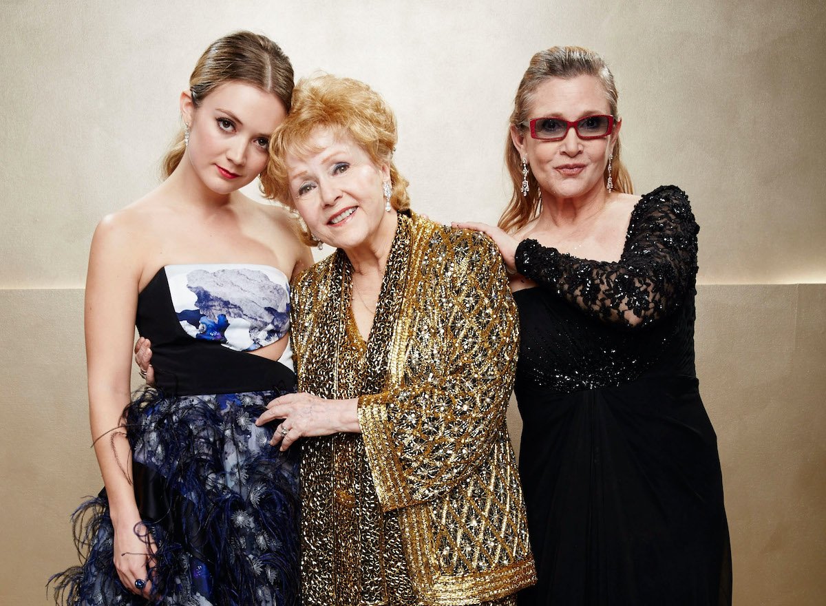 Billie Lourd, Carrie Fisher and Debbie Reynolds pose during TNT's 21st Annual Screen Actors Guild Awards on January 25, 2015 | Kevin Mazur/WireImage