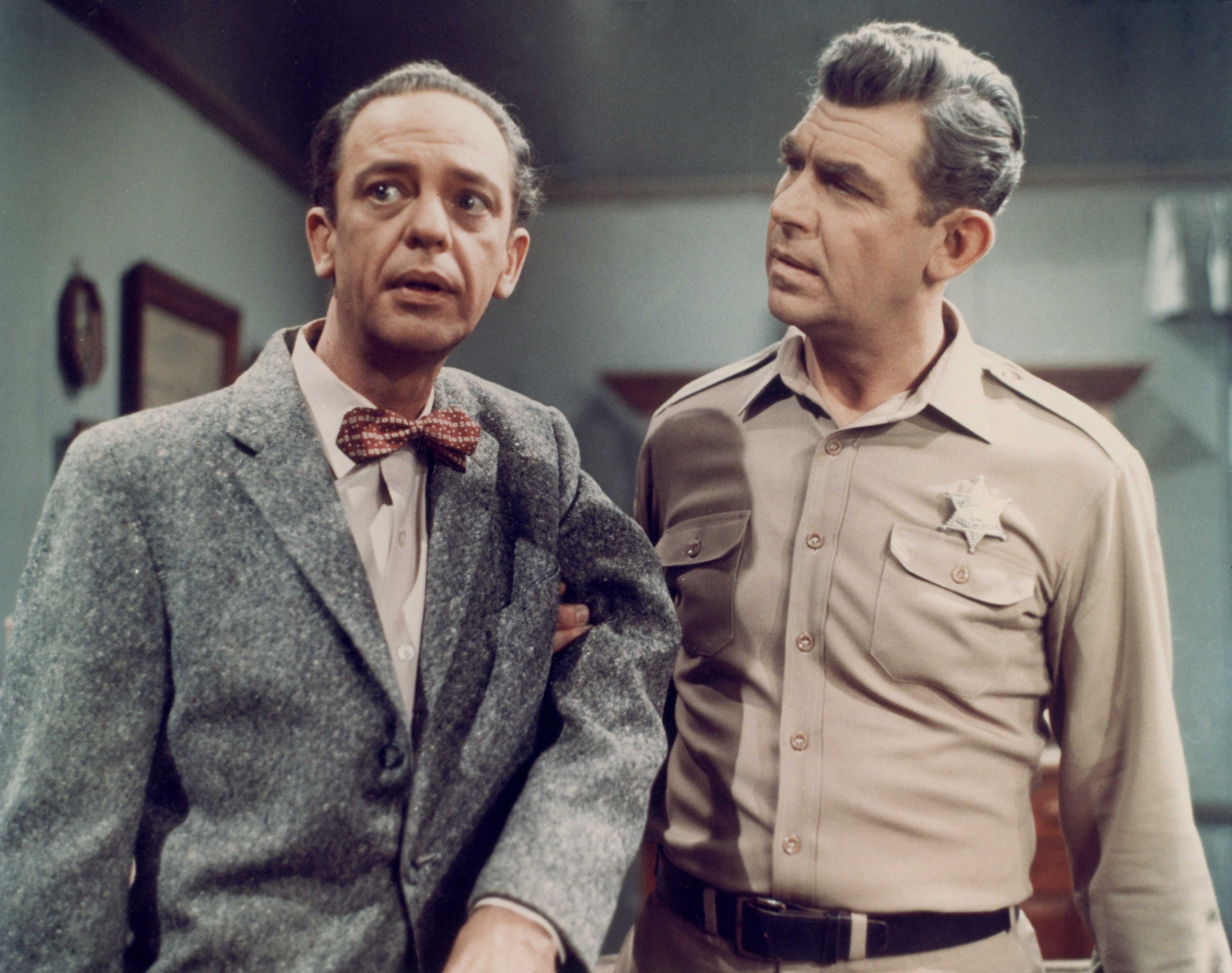 Don Knotts (1924 - 2006) as Deputy Barney Fife and Andy Griffith (right) as Sheriff Andy Taylor in a scene from the television series 'The Andy Griffith Show', circa 1965.
