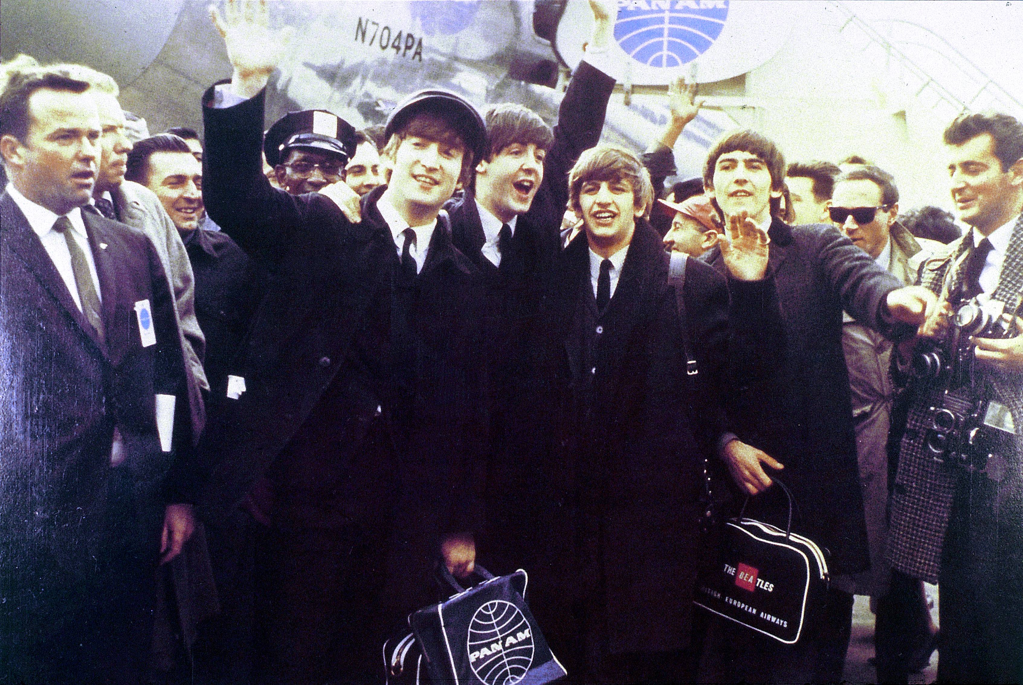 The Beatles arrive at Kennedy Airport in Feb. 1964 