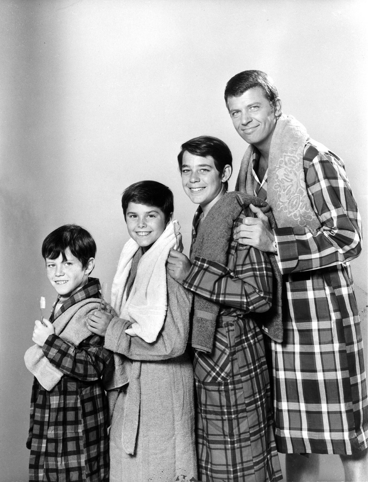 'The Brady Bunch' boys with Robert Reed at right