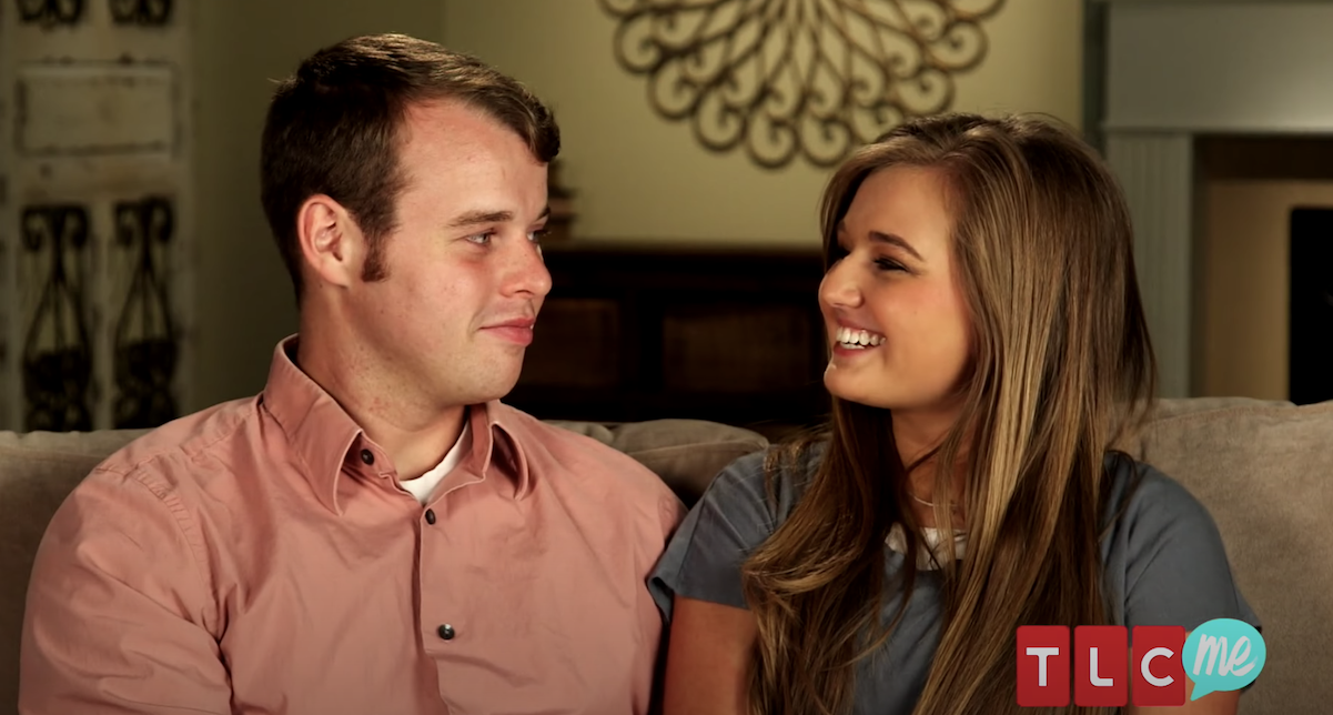 Joe and Kendra Duggar smiling at each other