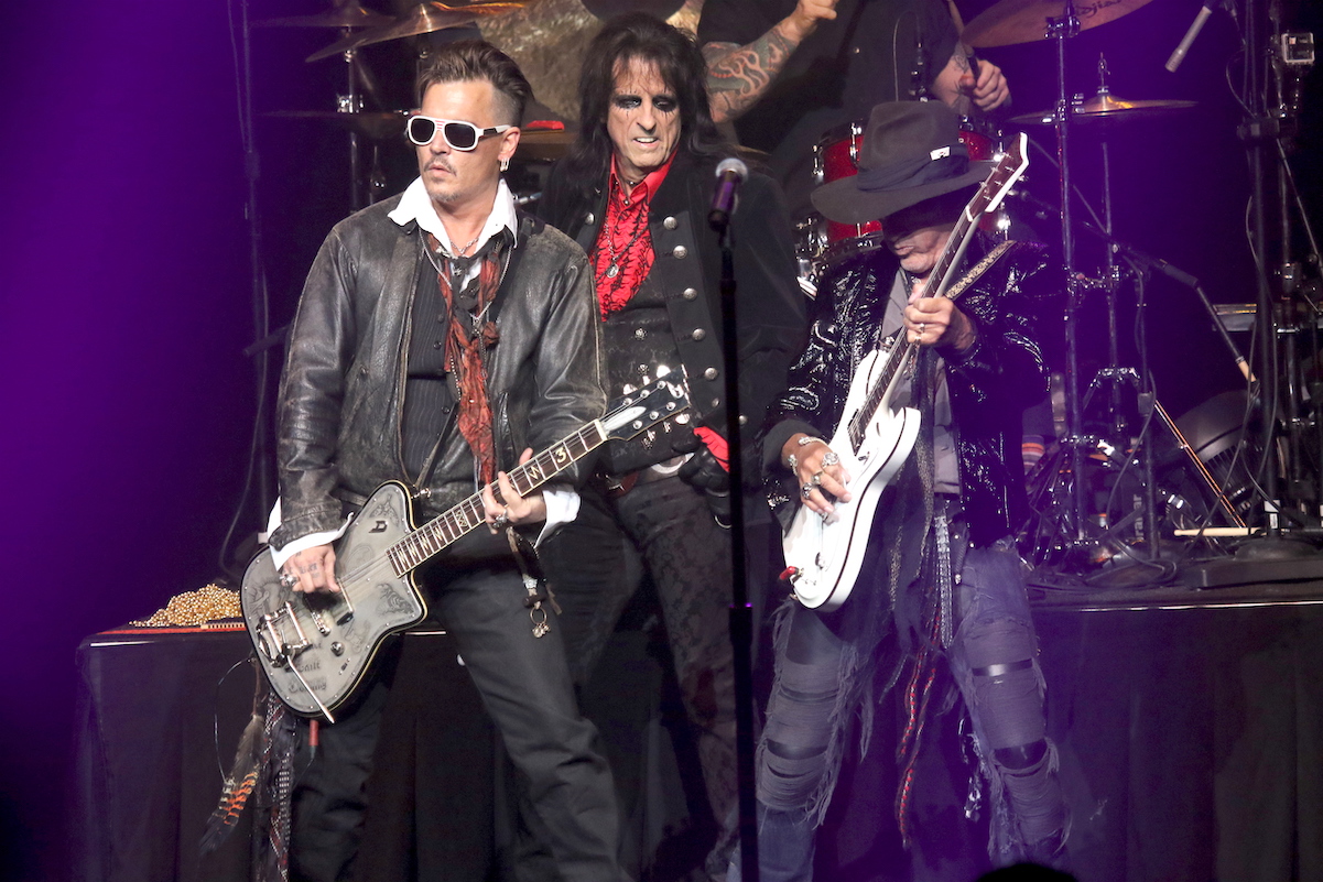 Johnny Depp (right) with his Hollywood Vampires bandmates Alice Cooper and Joe Perry