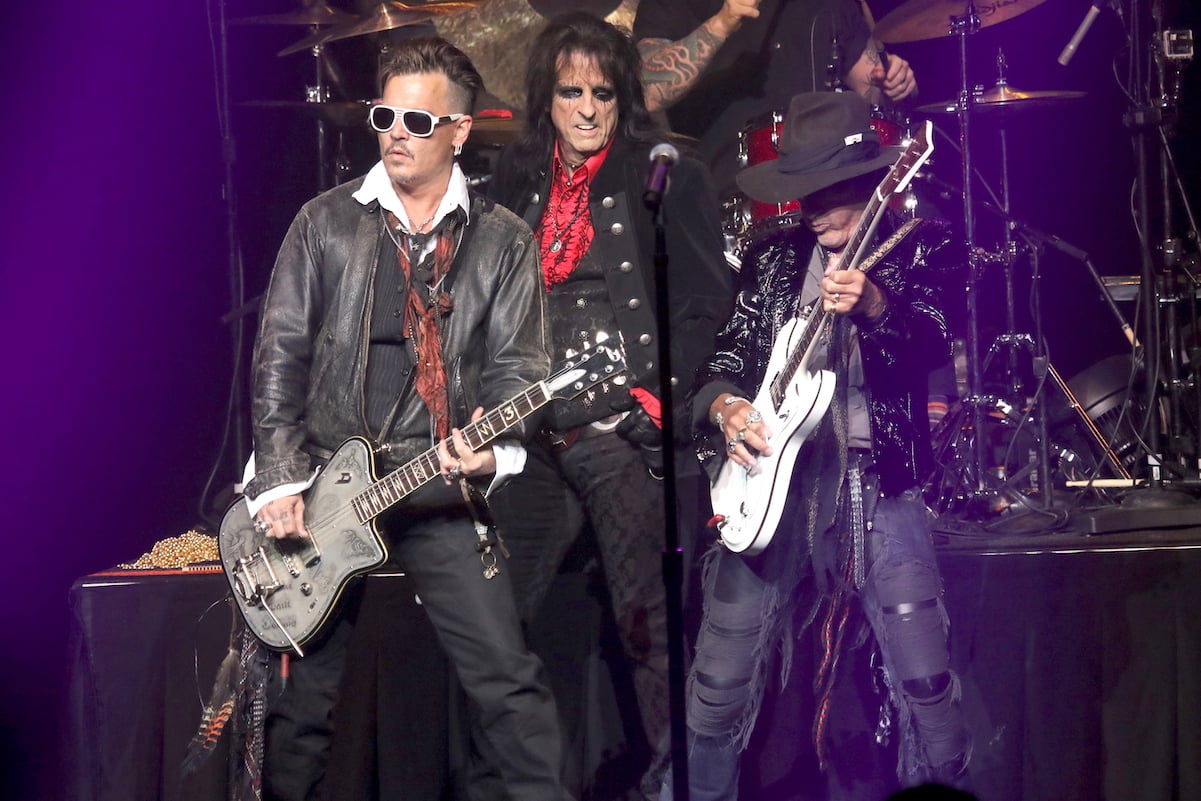 Johnny Depp (right) with his Hollywood Vampires bandmates Alice Cooper and Joe Perry