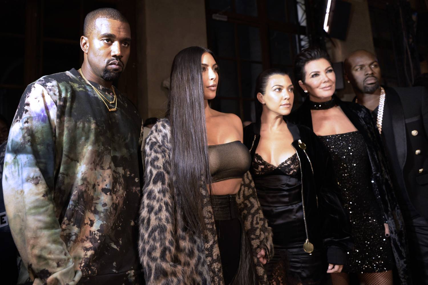 (From L) Kanye West, Kim Kardashian, Kourtney Kardashian, Kris Jenner and Corey Gamble attend the Off-white 2017 Spring/Summer ready-to-wear collection fashion show, on September 29, 2016 in Paris.