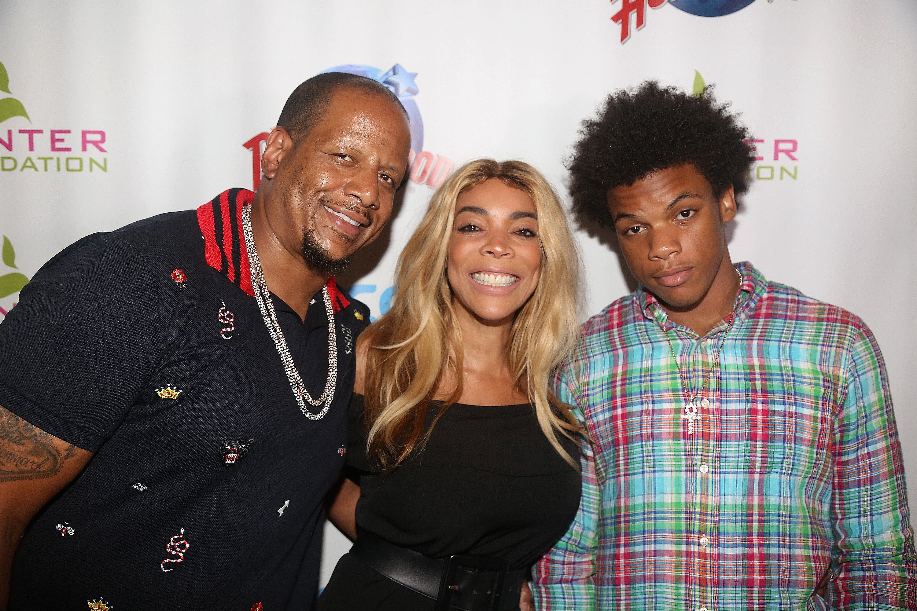 NEW YORK, NY - JULY 11: (EXCLUSIVE COVERAGE)(L-R) Kevin Hunter, wife Wendy Williams and son Kevin Hunter Jr pose at a celebration for The Hunter Foundation Charity that helps fund programs for families and youth communities in need of help and guidance at Planet Hollywood Times Square on July 11, 2017 in New York City.