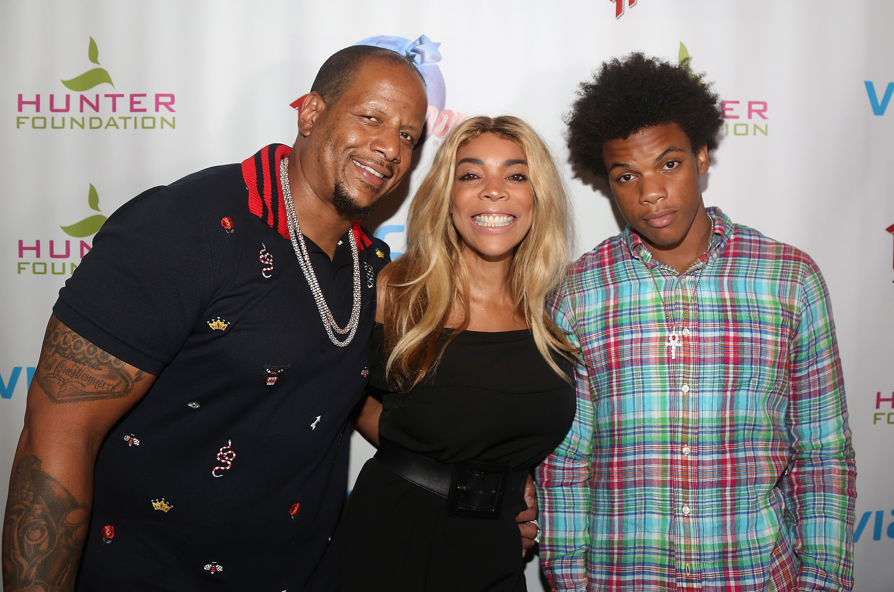 EW YORK, NY - JULY 11: (EXCLUSIVE COVERAGE)(L-R) Kevin Hunter, wife Wendy Williams and son Kevin Hunter Jr pose at a celebration for The Hunter Foundation Charity that helps fund programs for families and youth communities in need of help and guidance at Planet Hollywood Times Square on July 11, 2017 in New York City.