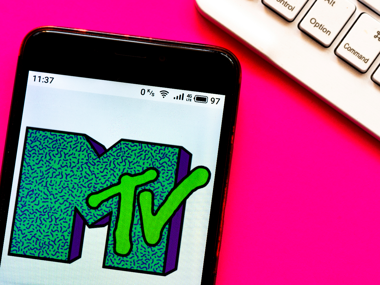 In this photo illustration a MTV (originally an initialism of Music Television) logo seen displayed on a smartphone