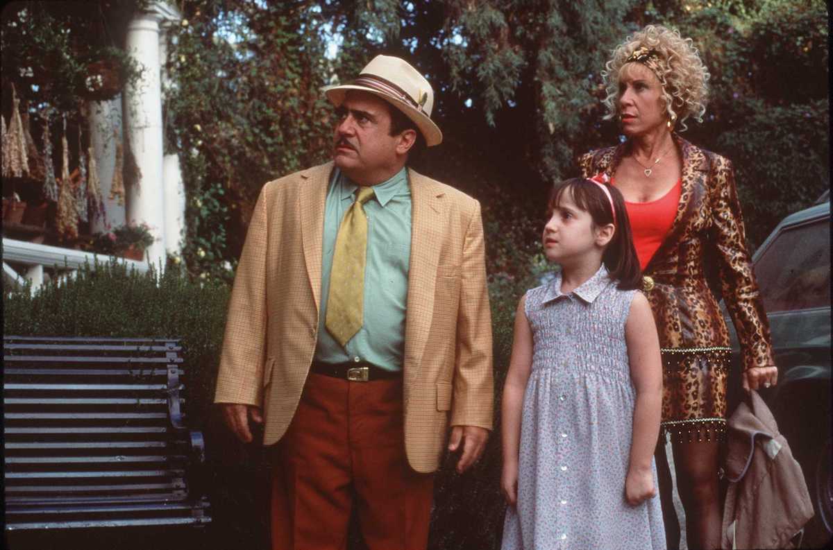 Danny DeVito, Mara Wilson, and Rhea Perlman in "Matilda" | Columbia/TriStar Pictures via Getty Images