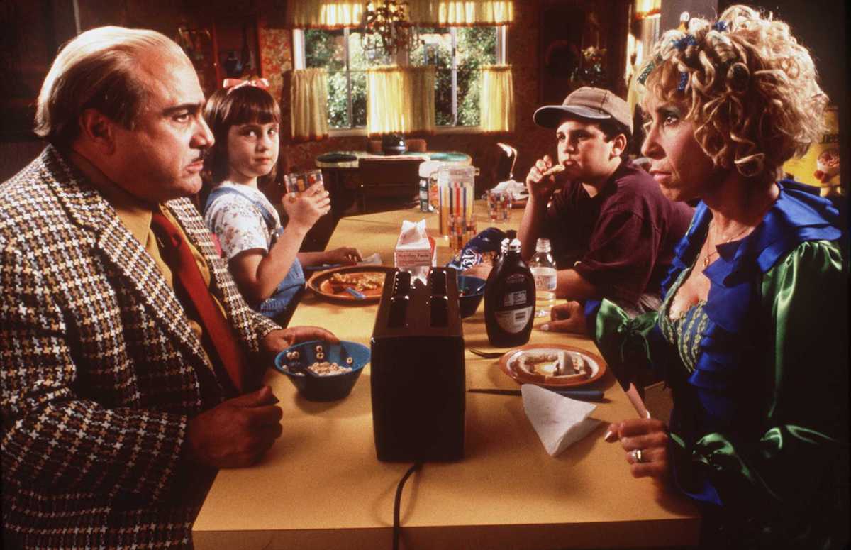 1996 Danny DeVito, Mara Wilson, Brian Levinson, and Rhea Perlman stars in the new movie "Matilda" | Columbia/TriStar Pictures via Getty Images