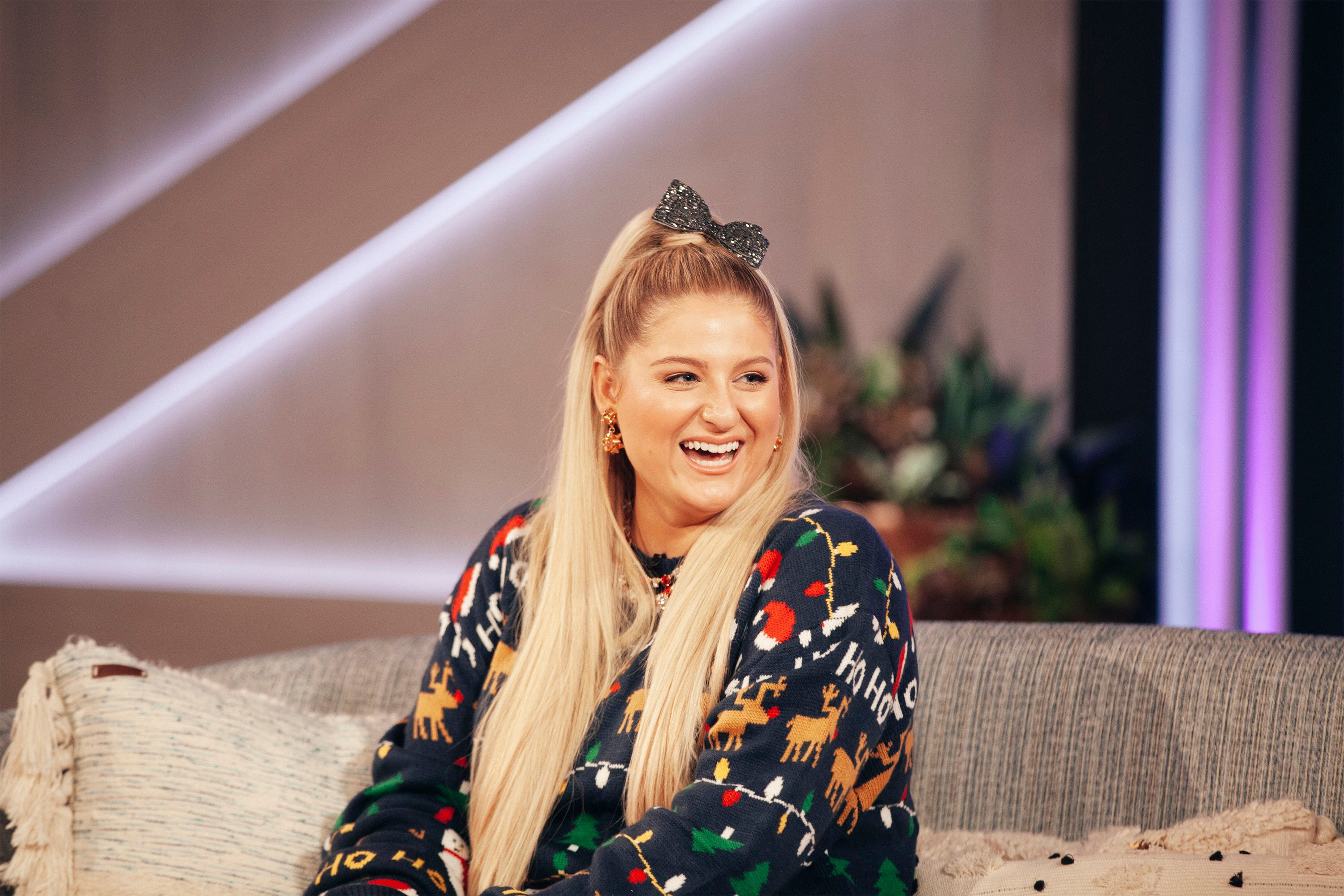 Meghan Trainor smiles while being interviewed