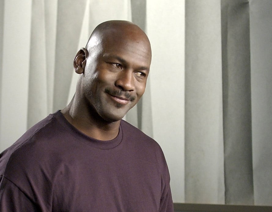 Michael Jordan smirks while filming a commercial
