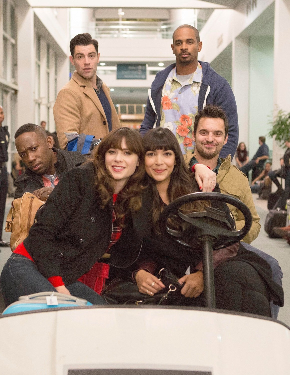 Zooey Deschanel, Lamorne Morris, Max Greenfield, Damon Wayans Jr., Jake Johnson and Hannah Simone in the "LAXmas" episode of 'New Girl'