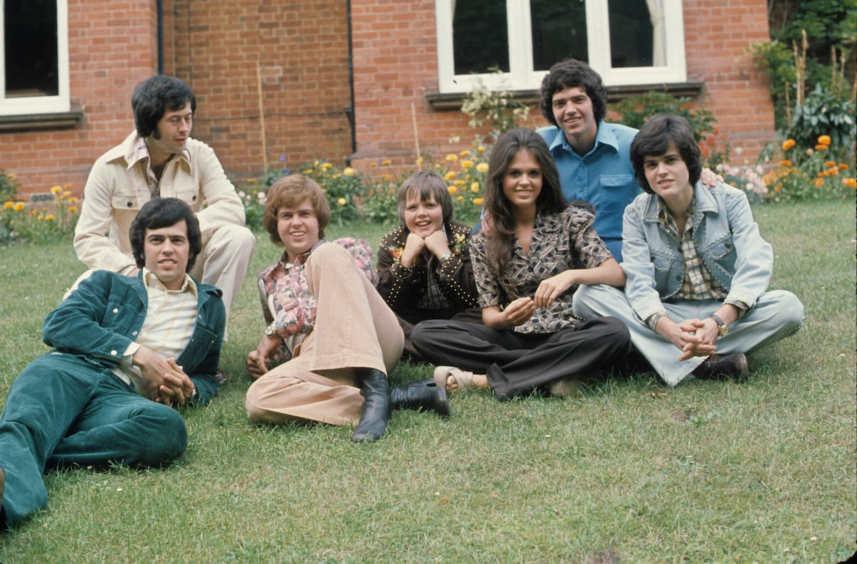 The Osmonds, Wayne, Jay, Merrill, Jimmy, Marie, Alan and Donny during a visit to the UK circa 1974 in England | Anwar Hussein/Getty Images