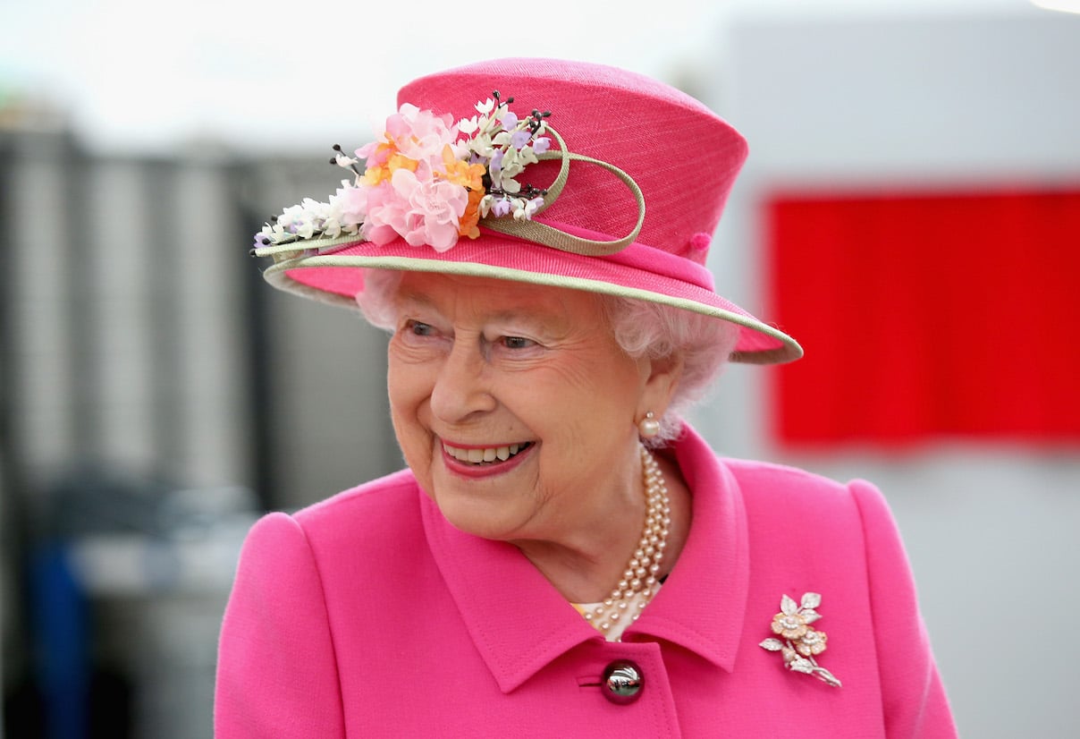 Queen Elizabeth II arrives at the Queen Elizabeth II delivery office
