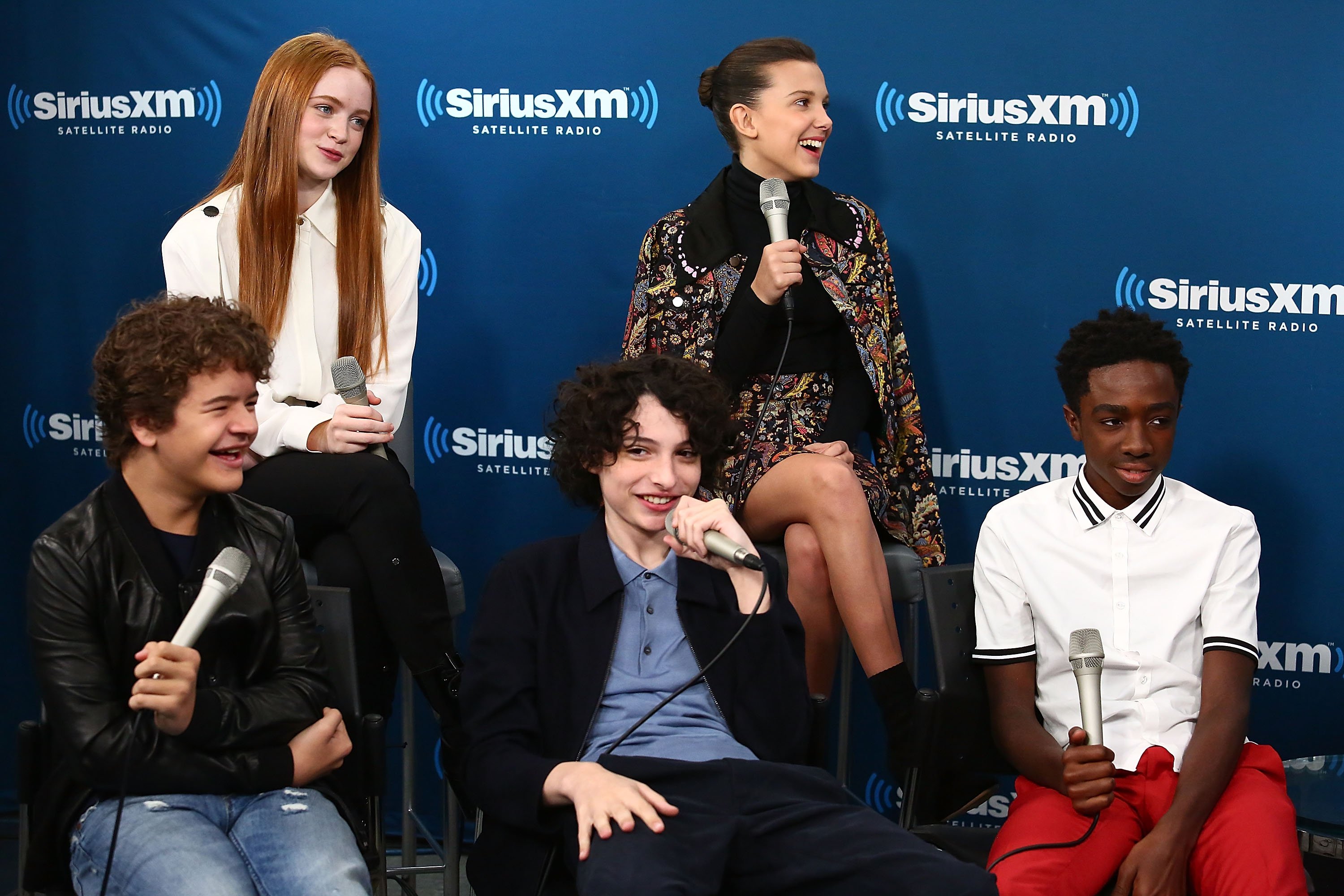 NEW YORK, NY - NOVEMBER 01: (Clockwise from top left) Actors Sadie Sink, Millie Bobby Brown, Caleb McLaughlin, Finn Wolfhard and Gaten Matarazzo attend SiriusXM's 'Town Hall' cast of Stranger Things on SiriusXM's Entertainment Weekly Radio on November 1, 2017 in New York City.