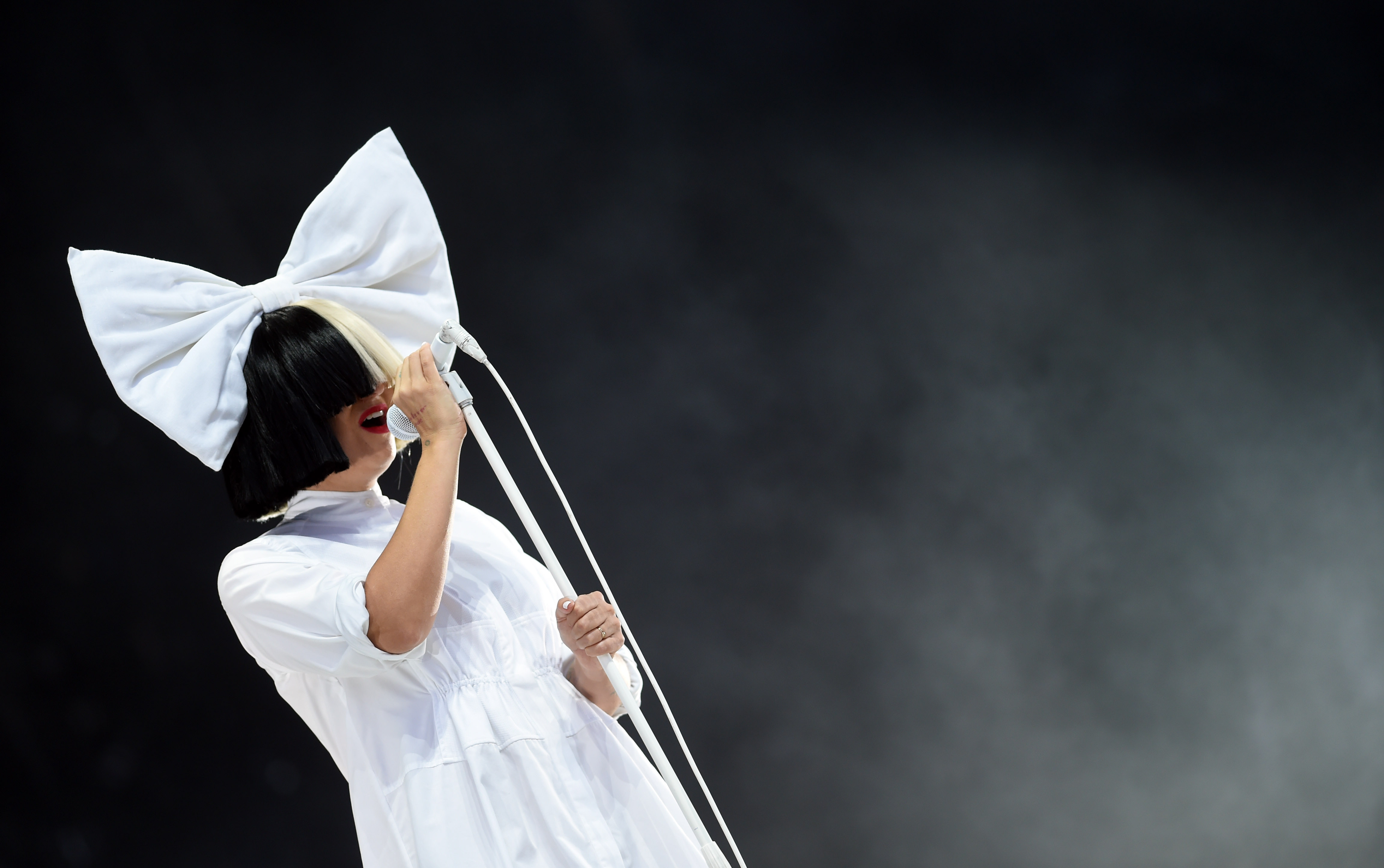 Sia singing