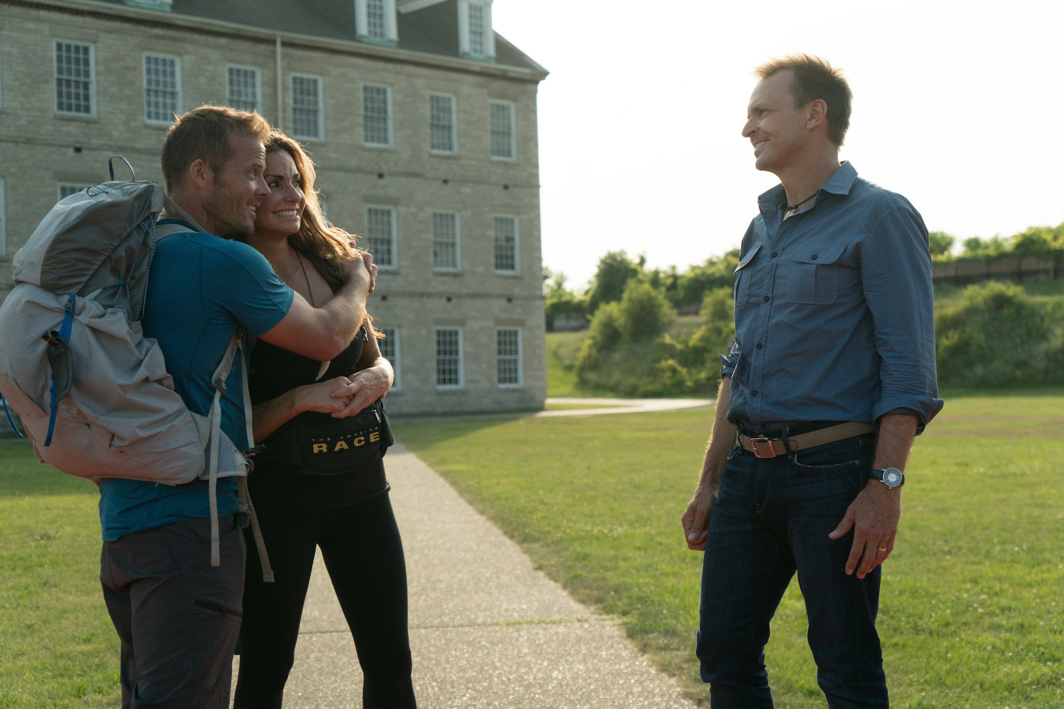 Phil Keoghan with a team from 'The Amazing Race'