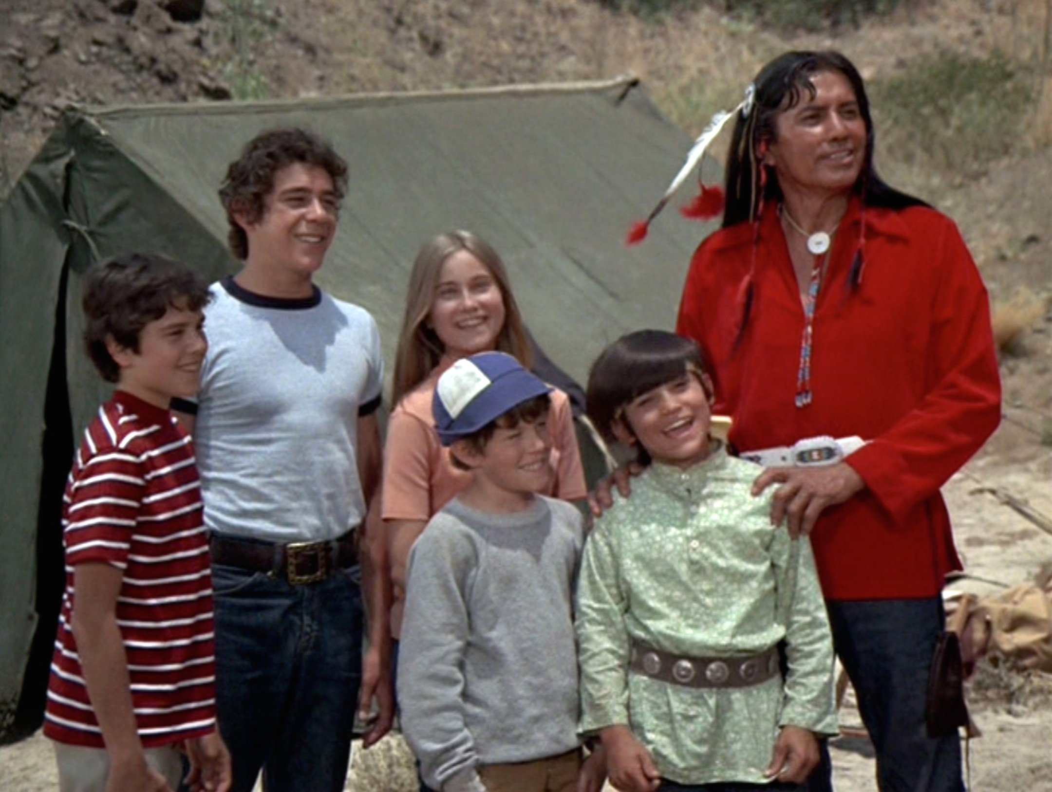 Christopher Knight as Peter Brady, Barry Williams as Greg Brady, Maureen McCormick as Marcia Brady, Mike Lookinland as Bobby Brady, Michele Campo as Jimmy, and Jay Silverheels as Chief Eagle Cloud in 'The Brady Bunch'