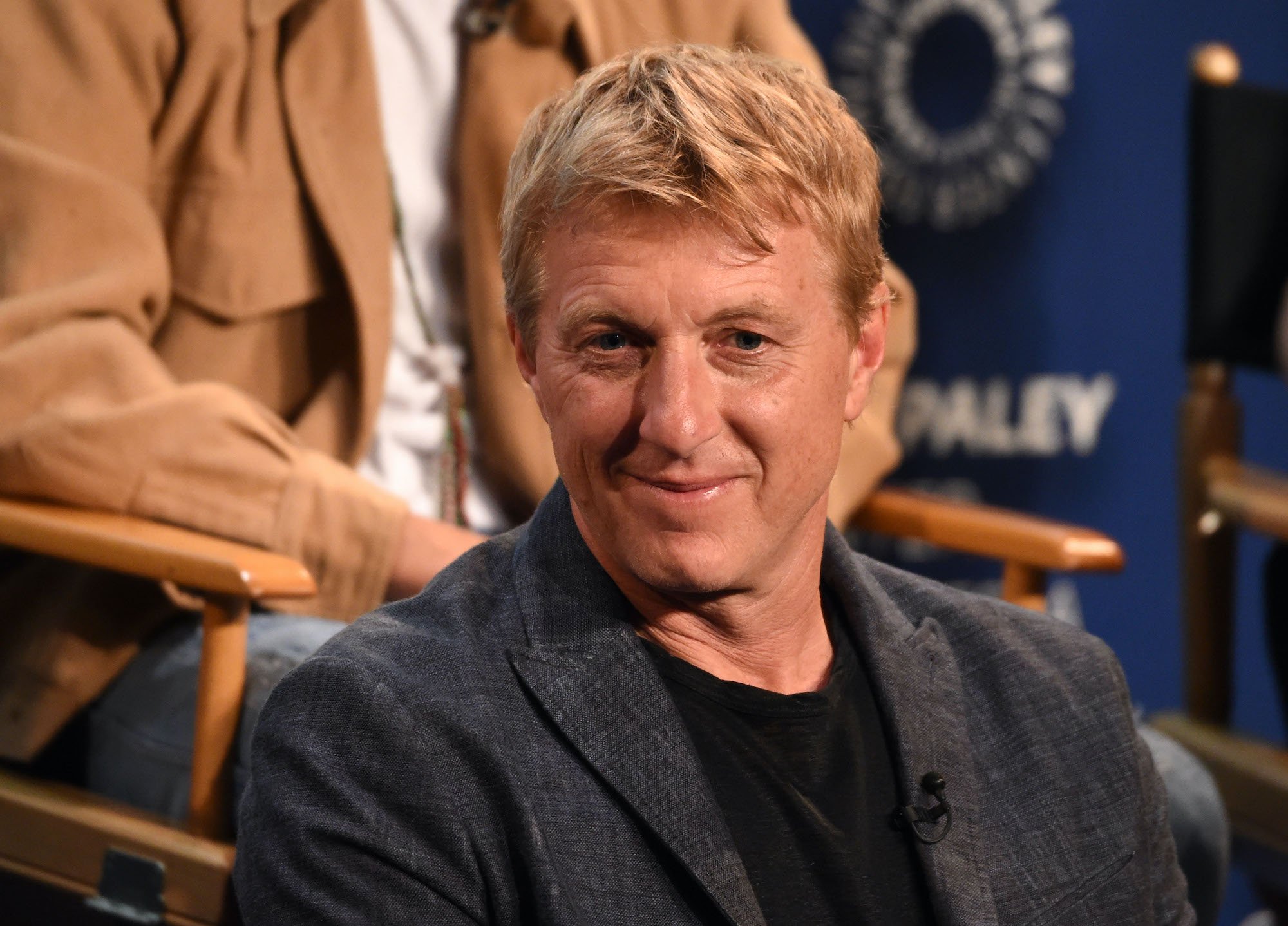 Billy Zabka speaks onstage