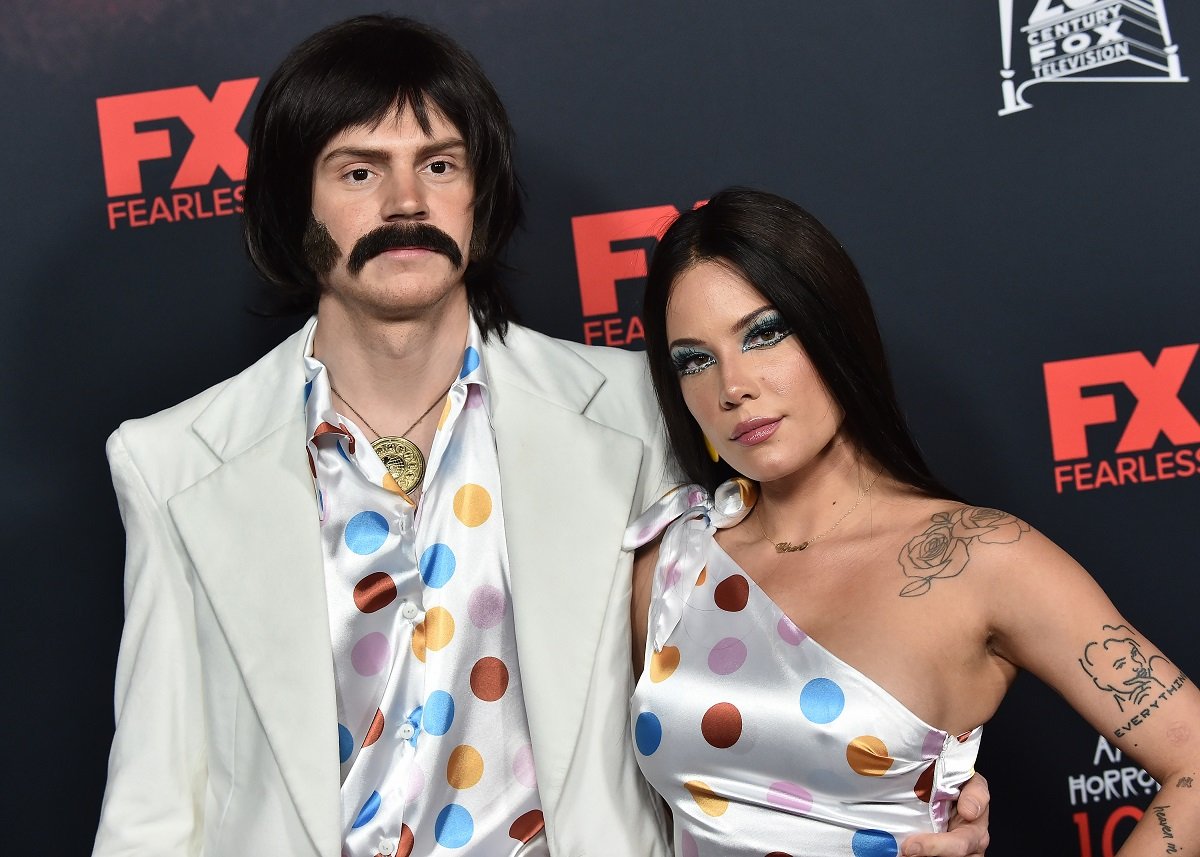 Evan Peters and Halsey arrive for the event celebrating 100 episodes of FX's 'American Horror Story' in Los Angeles on October 26, 2019.
