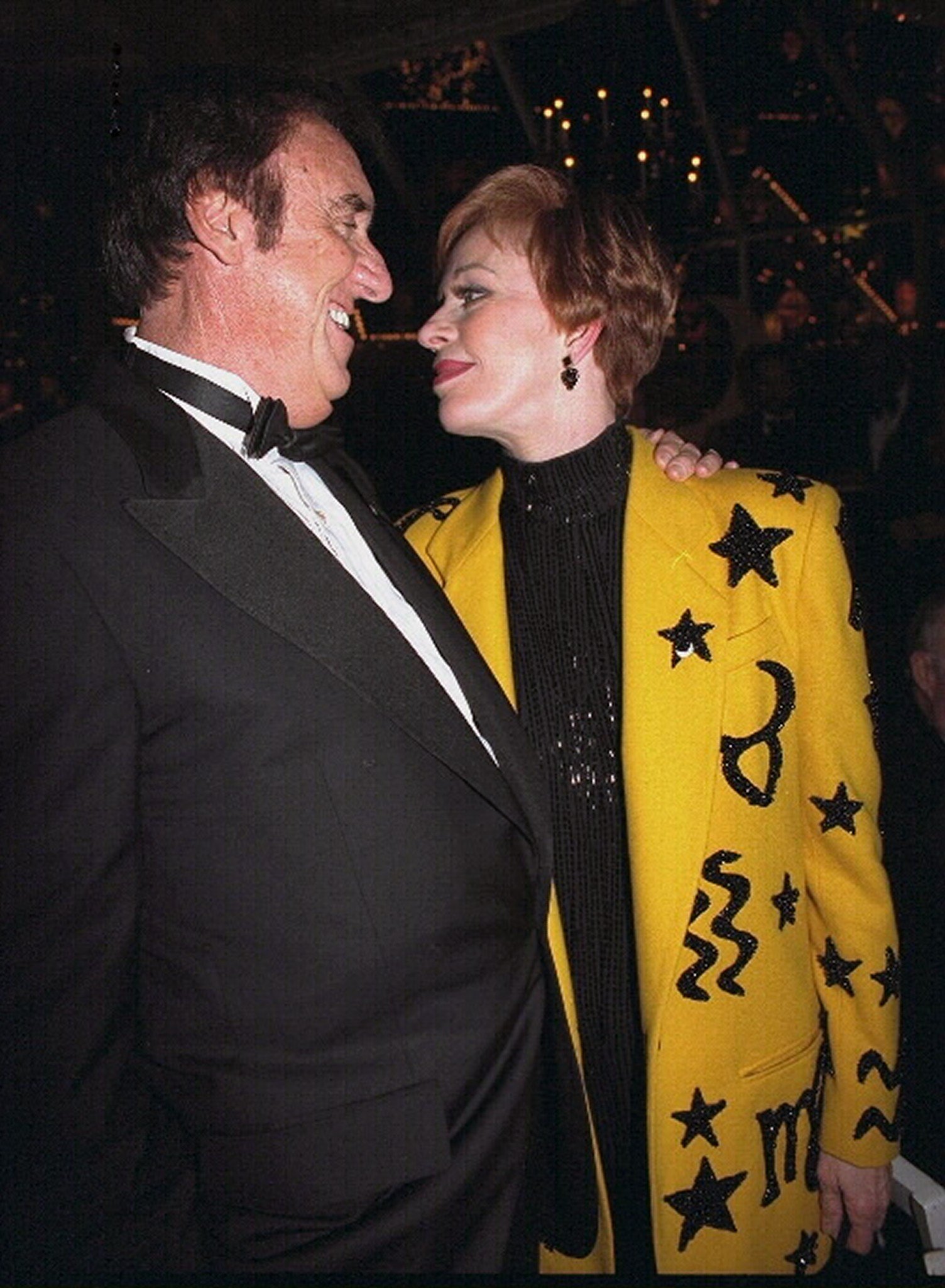 Carol Burnett is greeted by Jim Nabors in 1995