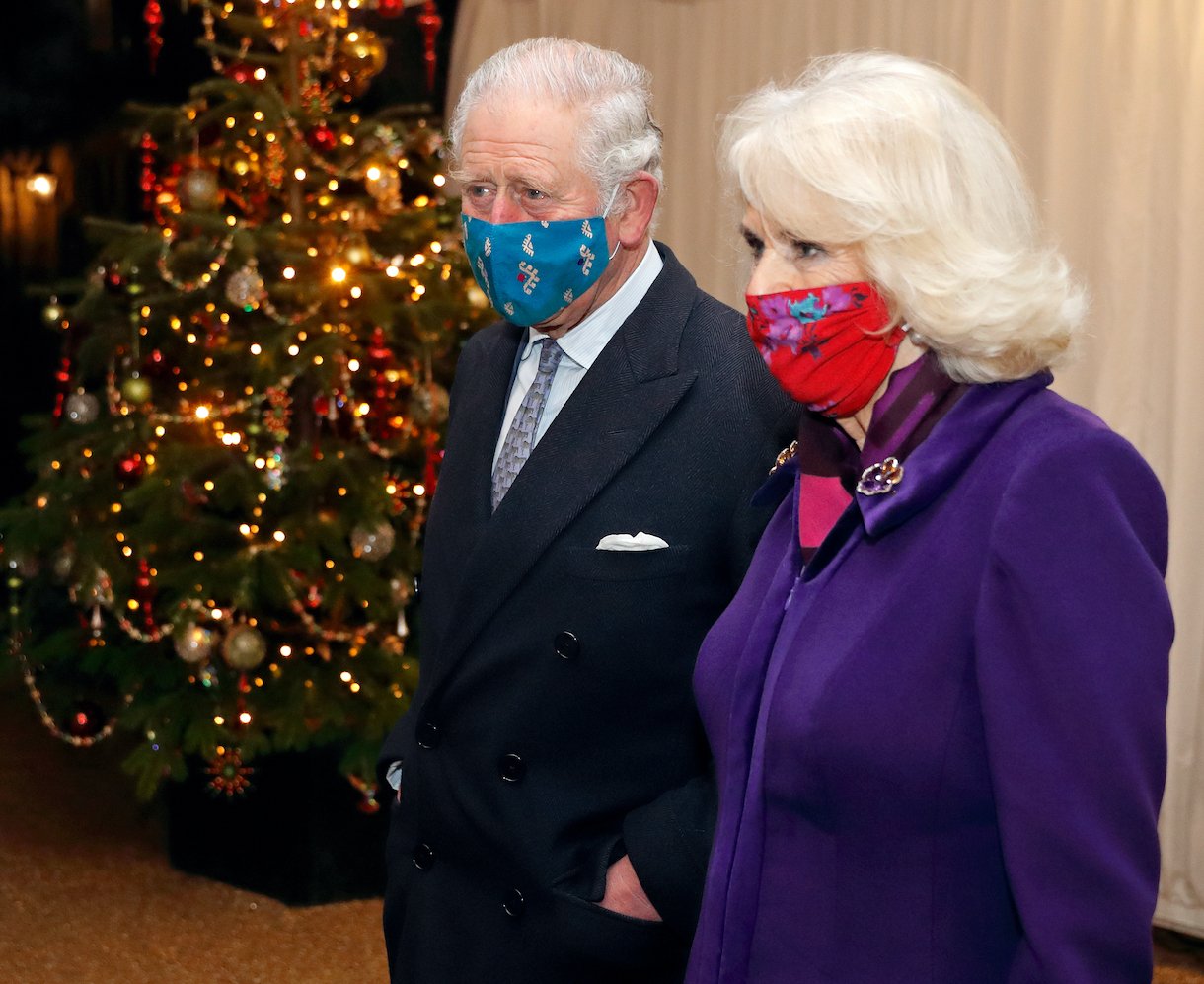 Prince Charles, Prince of Wales and Camilla, Duchess of Cornwall wear a face masks in Berkshire