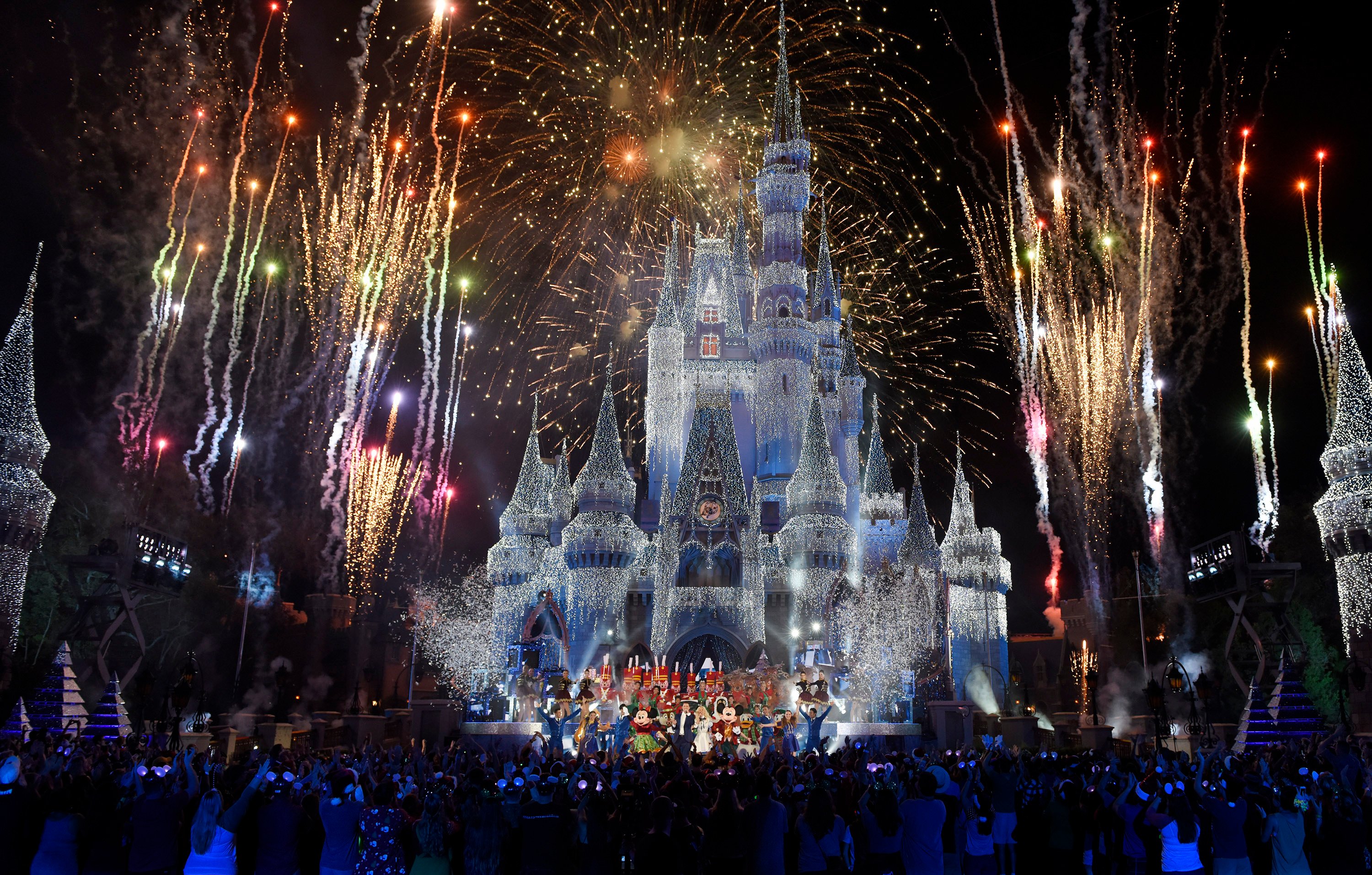 A Disney castle with fireworks