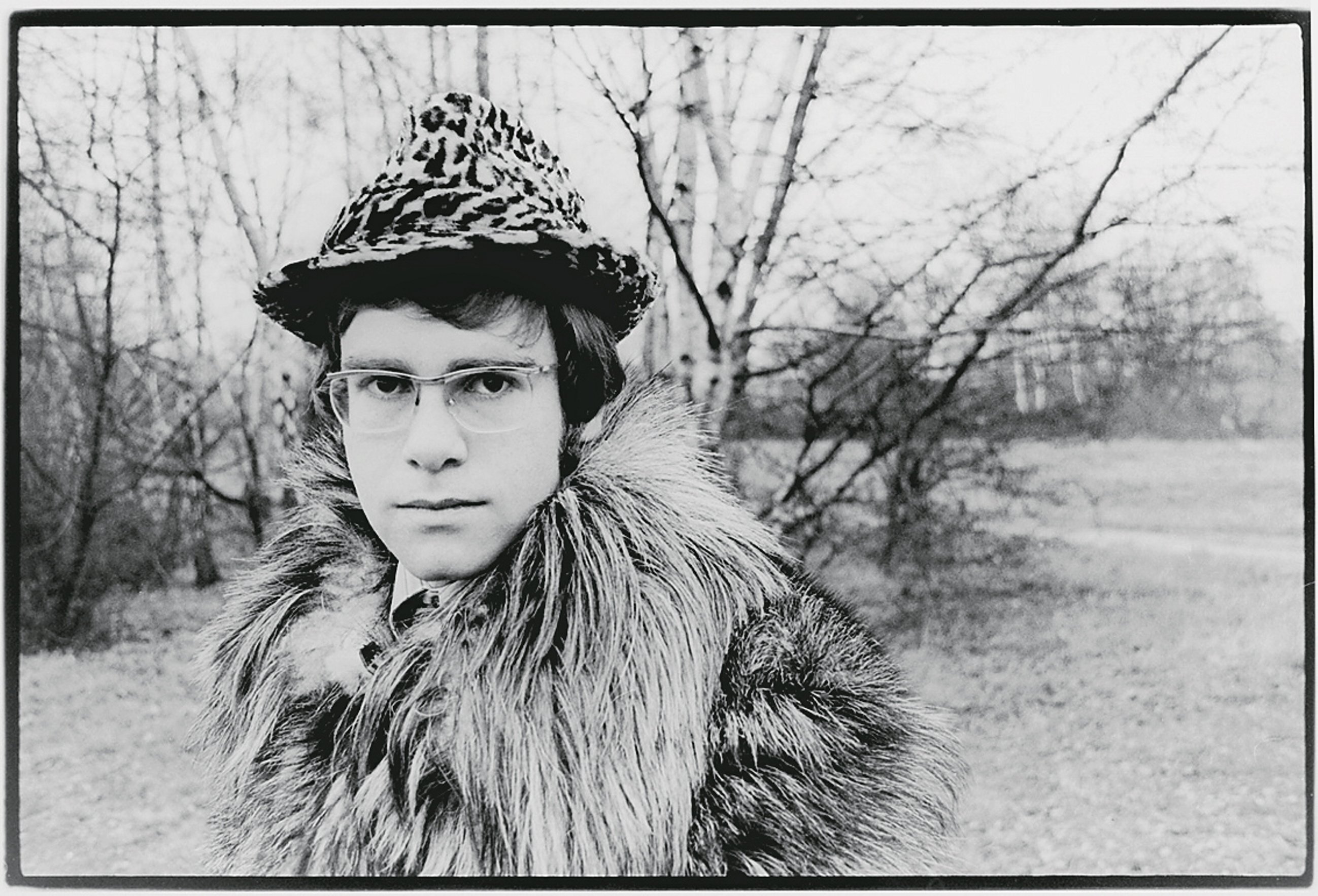 Elton John by trees